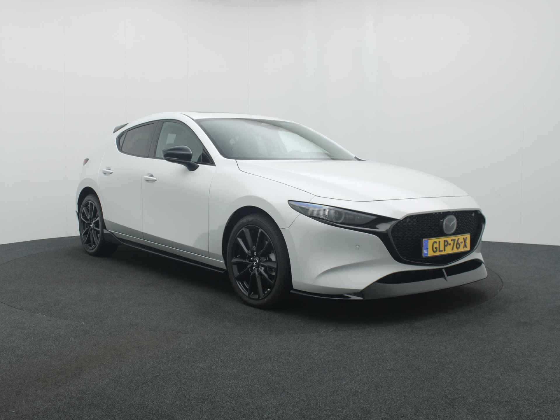 Mazda 3 2.0 e-SkyActiv-X Takumi automaat met Sunroof en aero pack | demo voordeel - 8/47