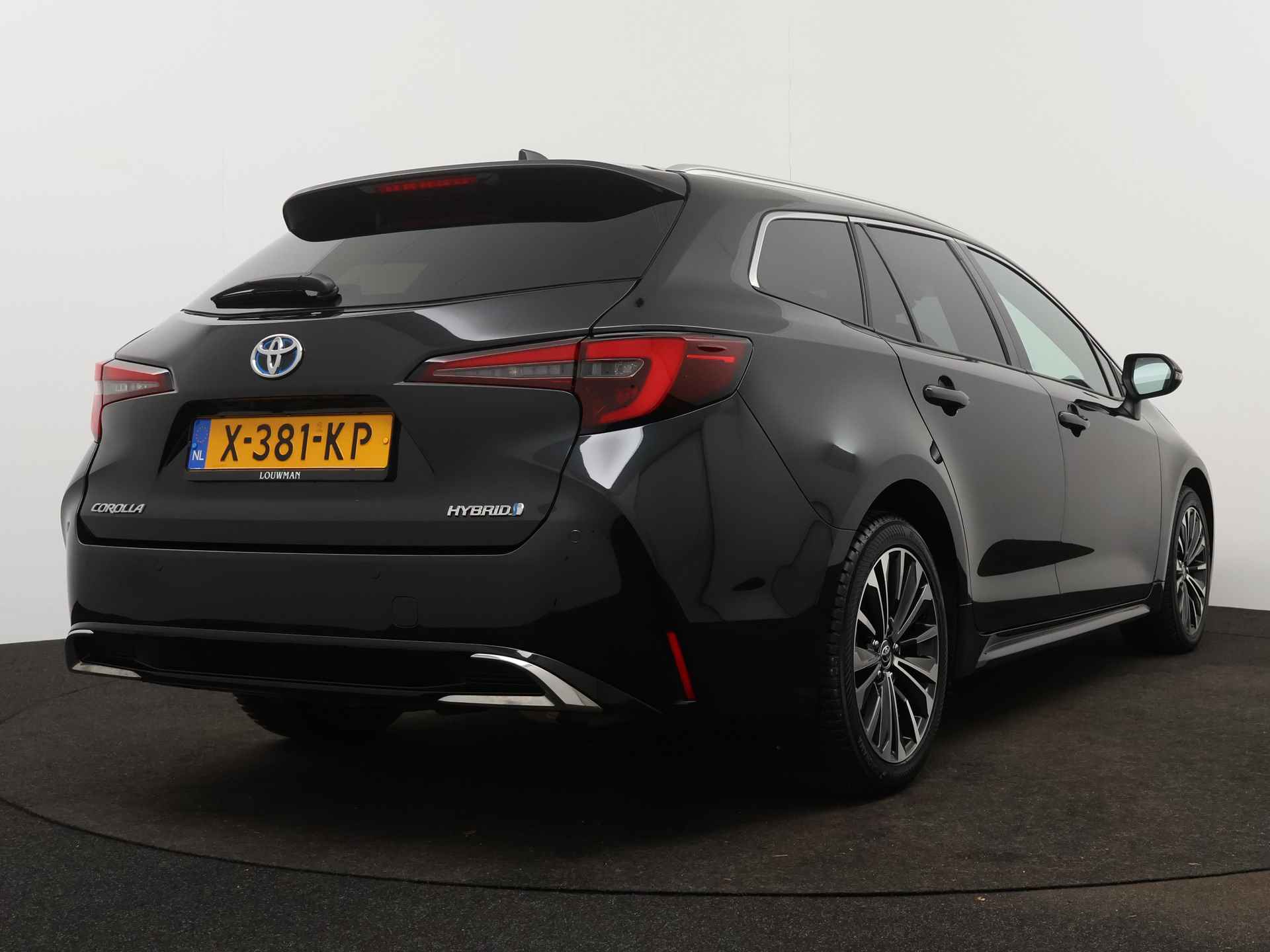 Toyota Corolla Touring Sports 1.8 Hybrid First Edition | Camera | Parkeersensoren | Half leder | Climate Control | Stoelverwarming | Draadloze telefoonlader | Cruise Control Adaptief | - 3/49