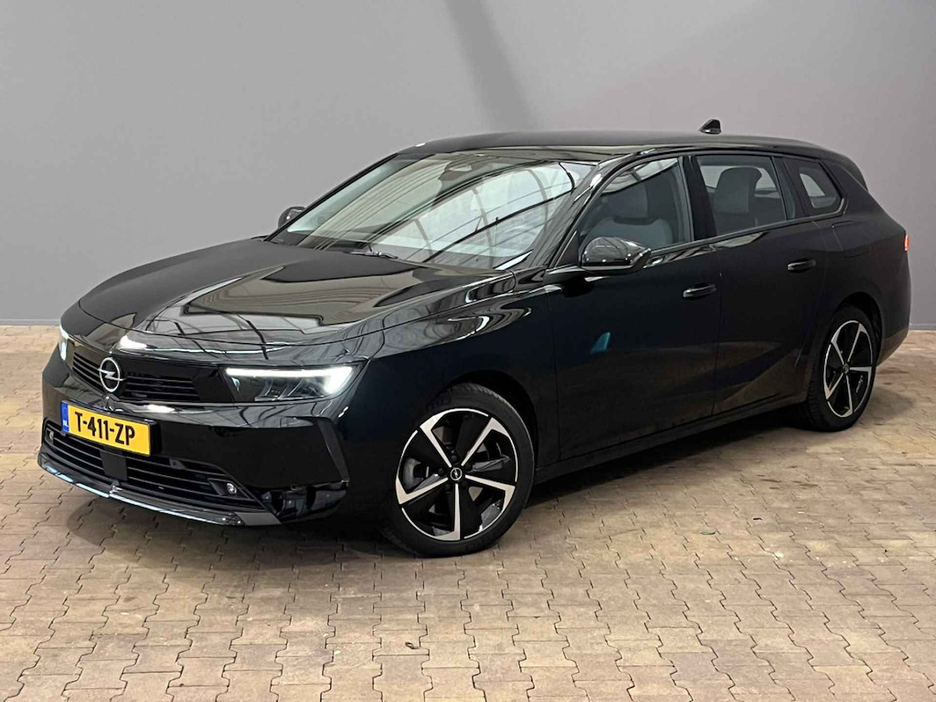 Opel Astra Sports Tourer  Automaat 1.6 Turbo Hybrid | Apple Carplay/Android Auto|telefoonintegratie premium | DAB ontvanger | airco (automatisch) - 34/35