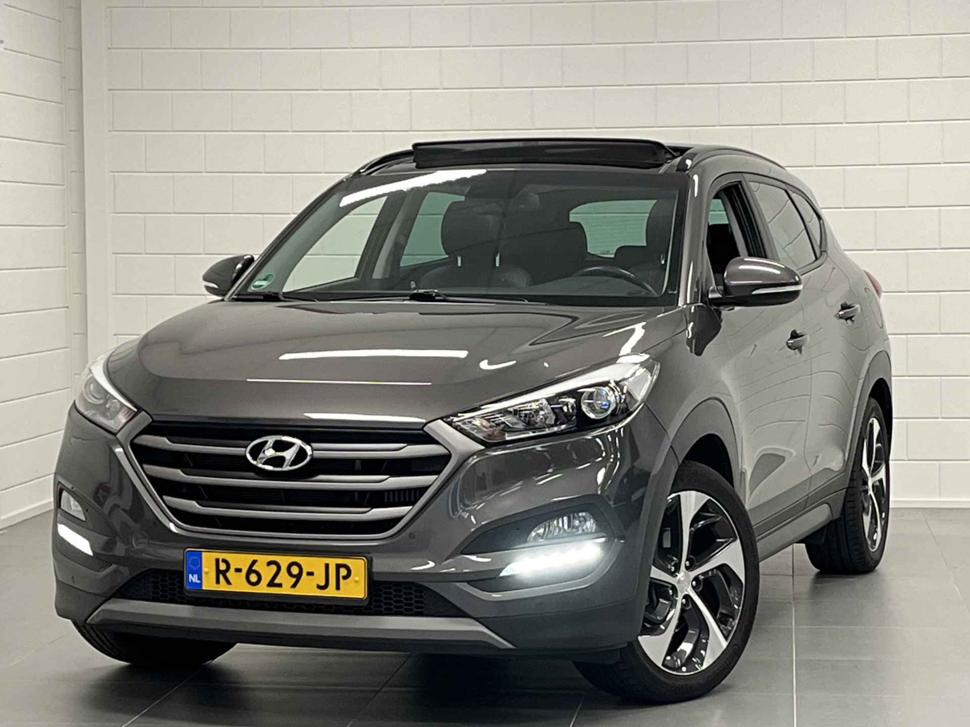 Hyundai Tucson 1.6 T-GDi Premium 4WD | Leder | Panoramadak | Navigatie - 39/43