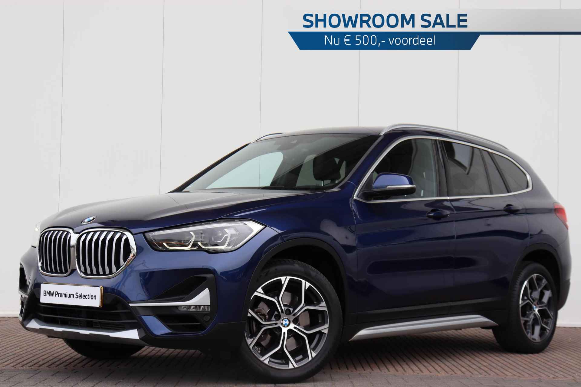 BMW X1 sDrive20i High Executive xLine / Panoramadak / Sportstoelen / Afneembare Trekhaak / Achteruitrijcamera / Stoelverwarming | Showroom Sale - 1/26