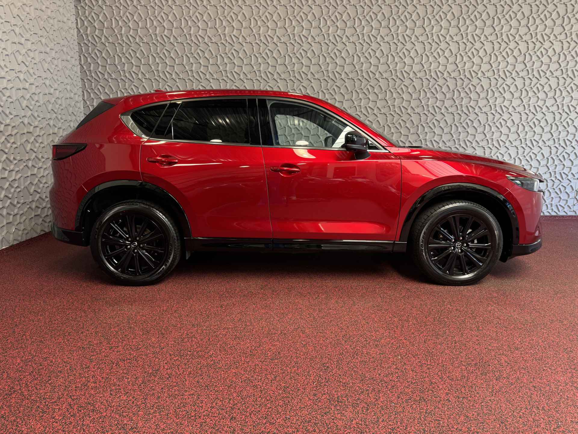 Mazda CX-5 E-SKYACTIV MHEV 2.0 165 PK HOMURA LEER BOSE ELEK.KLEP HEADUP 360.CAMERA 19''LMV FULL LED CARPLAY NAVI STOEL/STUUR VERW. STOELKOE 04/2024 - 51/68