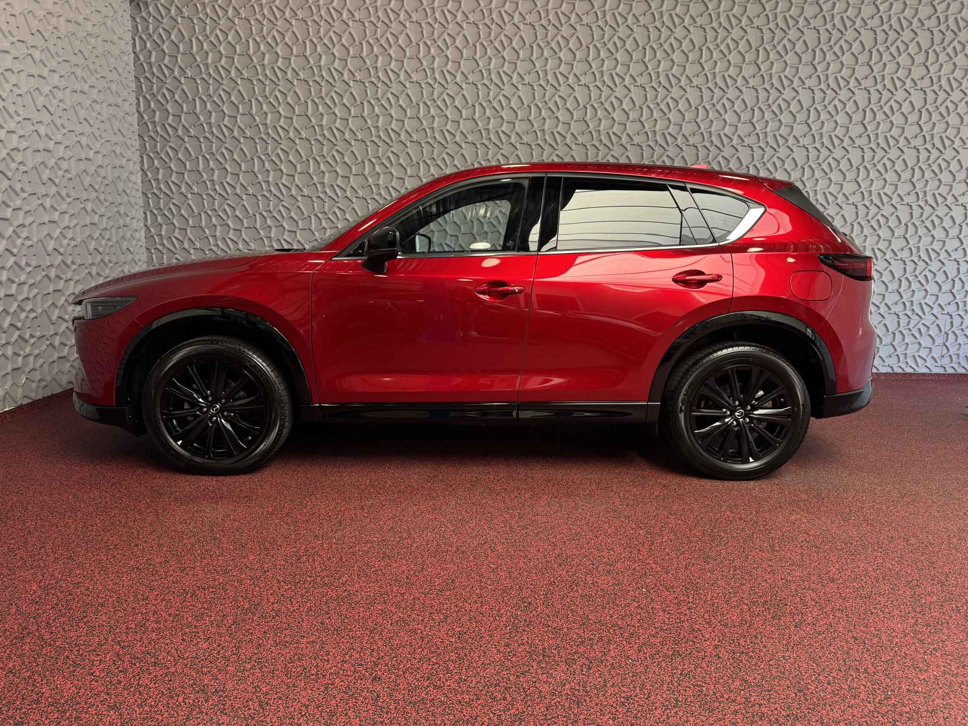 Mazda CX-5 E-SKYACTIV MHEV 2.0 165 PK HOMURA LEER BOSE ELEK.KLEP HEADUP 360.CAMERA 19''LMV FULL LED CARPLAY NAVI STOEL/STUUR VERW. STOELKOE 04/2024 - 52/68