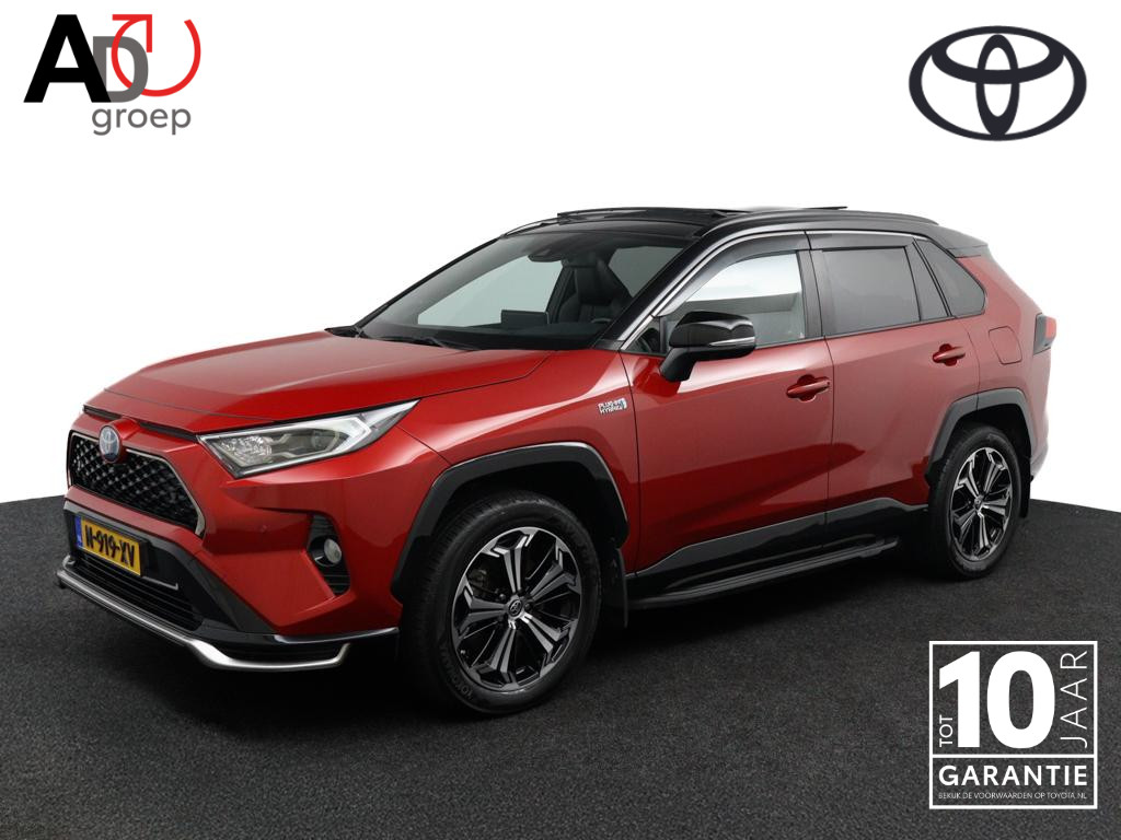 Toyota RAV4 2.5 Plug-in Hybrid AWD Bi-Tone Plus | Trekhaak Afneembaar | Treeplanken | Alarmsysteem | Lederen Bekleding | Stoelverwarming en Ventilatie | Bomvol |