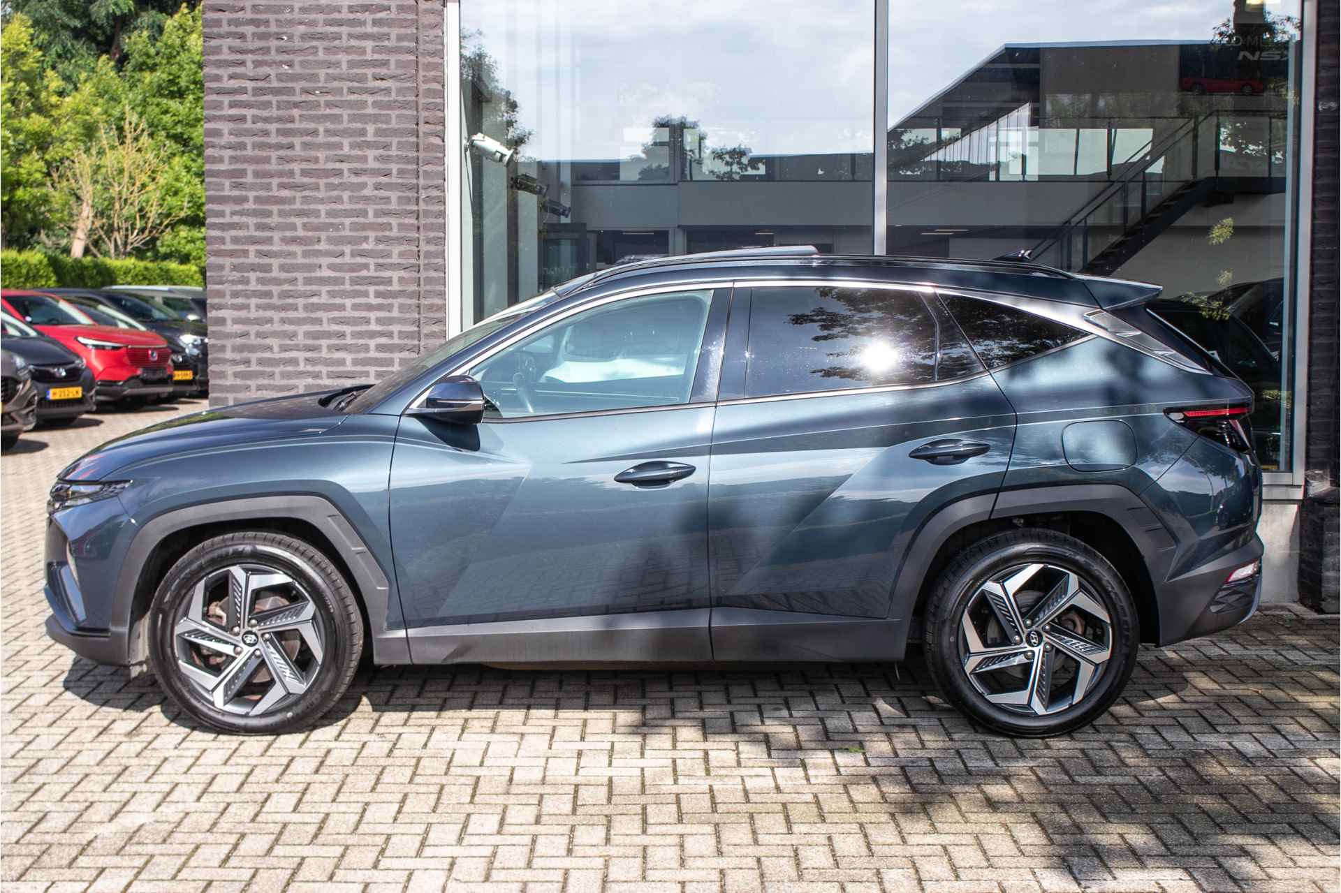 Hyundai Tucson 1.6 T-GDI PHEV Comfort Sky 4WD - All-in rijklrprs | Schuif/-kanteldak | Navi | Cruise - 2/40