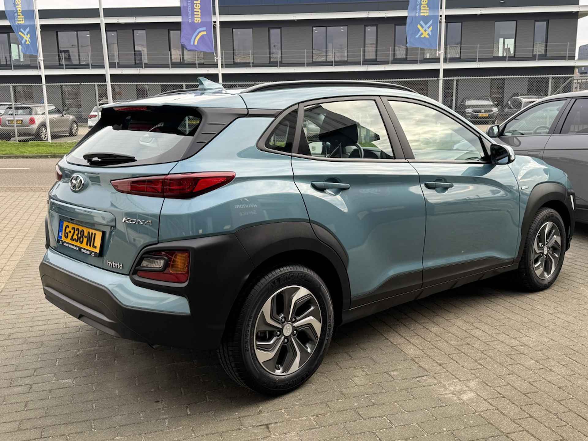 Hyundai Kona 1.6 GDI HEV Comfort | Navigatie | Premium audio | 1e eigenaar | - 9/30