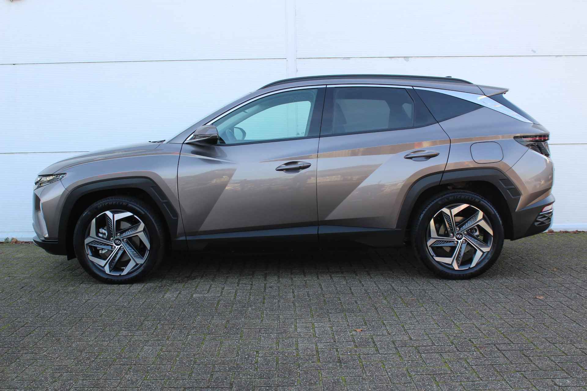 Hyundai Tucson 1.6 T-GDI PHEV Comfort Smart 4WD / Trekhaak (1350 KG) / Navigatie + Apple Carplay/Android Auto / Cruise Control Adaptief / Climate Control / Stoel- + Stuurverwarming / - 8/52