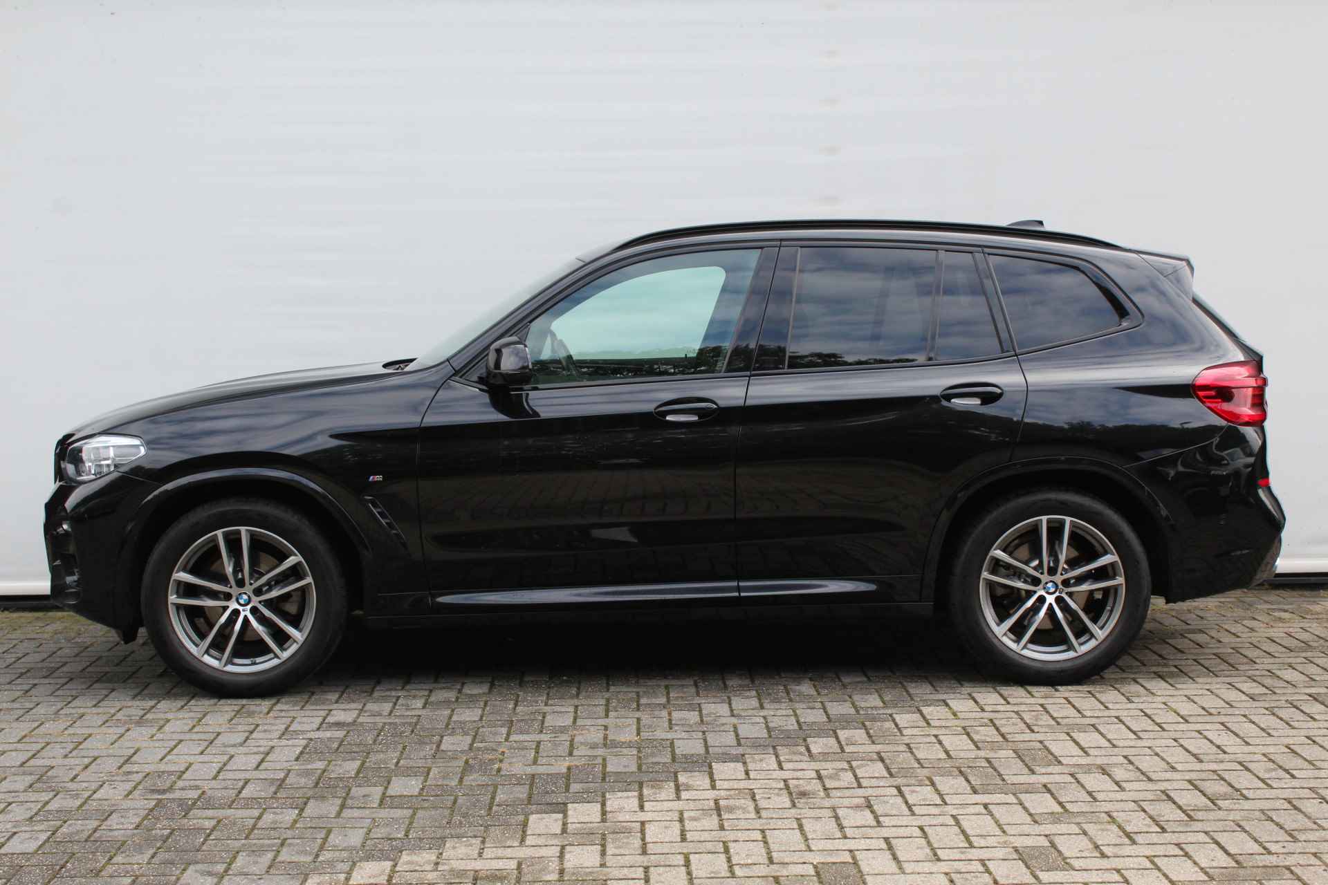 BMW X3 xDrive20i High Executive M Sport Automaat / Sportstoelen / Stoelverwarming / Adaptieve LED / Parking Assistant / Navigatie Professional / Getint glas achter - 6/28