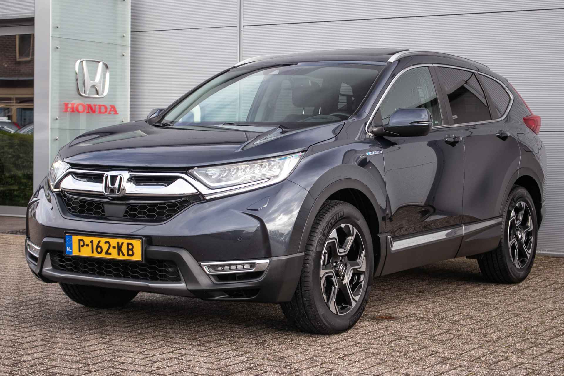 Honda CR-V 2.0 Hybrid AWD Executive automaat All-in rijklaarprijs | Dealerond. | Trekhaak | ADAS | Schuif/-kanteldak - 1/52