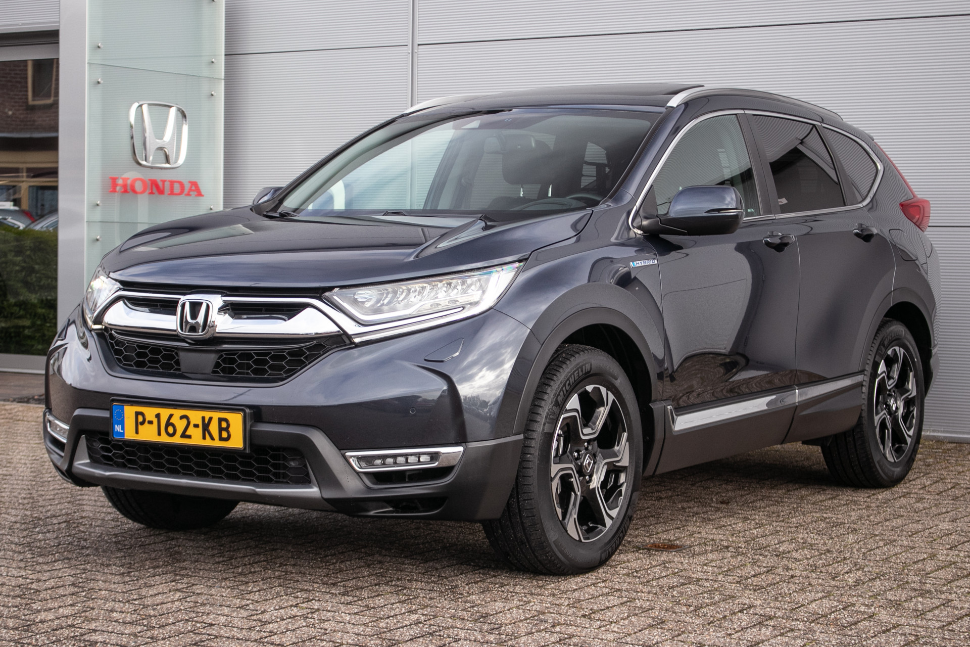 Honda CR-V 2.0 Hybrid AWD Executive automaat All-in rijklaarprijs | Dealerond. | Trekhaak | ADAS | Schuif/-kanteldak