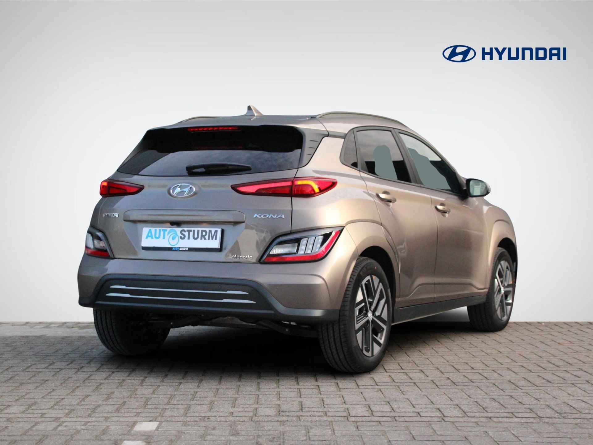 Hyundai Kona EV Fashion 39 kWh | Head-Up Display | Navigatie | Camera | Apple Carplay/Android Auto | Premium Audio | Keyless Entry | Adapt. Cruise Control | Dodehoek | Rijklaarprijs! - 4/25