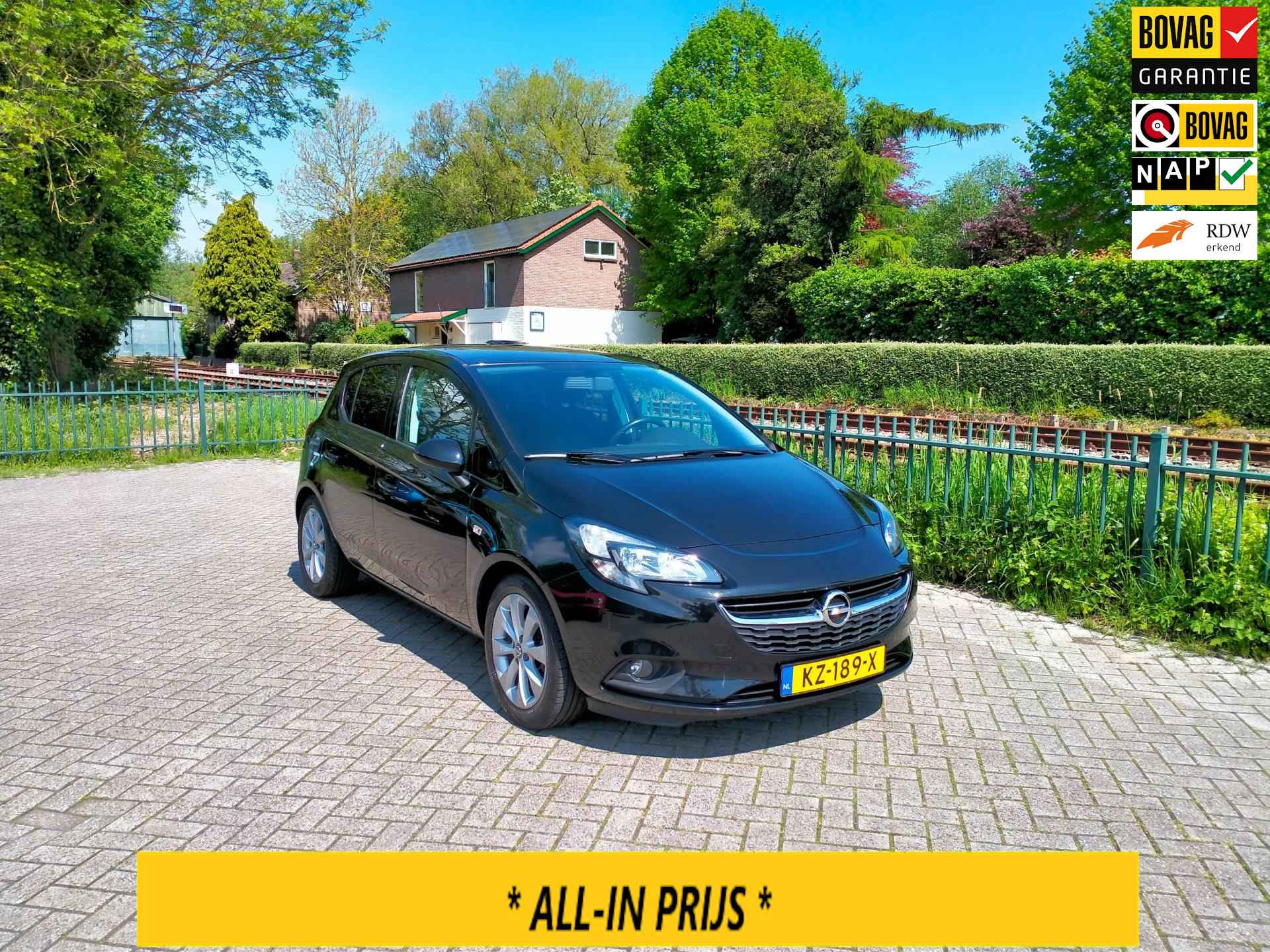 Opel Corsa 1.4 Edition + luxe uitv. clima 5 deurs lage km. RIJKLAAR - 1/25