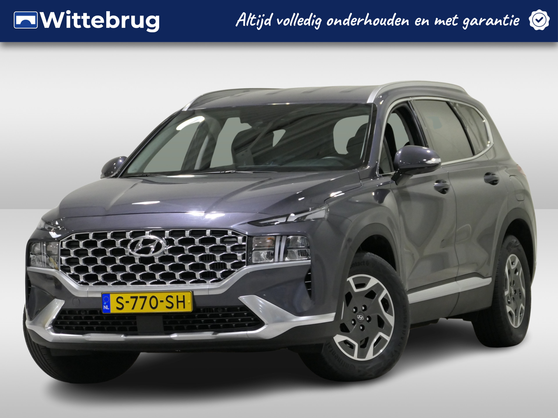 Hyundai Santa Fe 1.6 T-GDI HEV Comfort Smart 7p. 7-persoons | Parkeercamera | Lederen bekleding bij viaBOVAG.nl