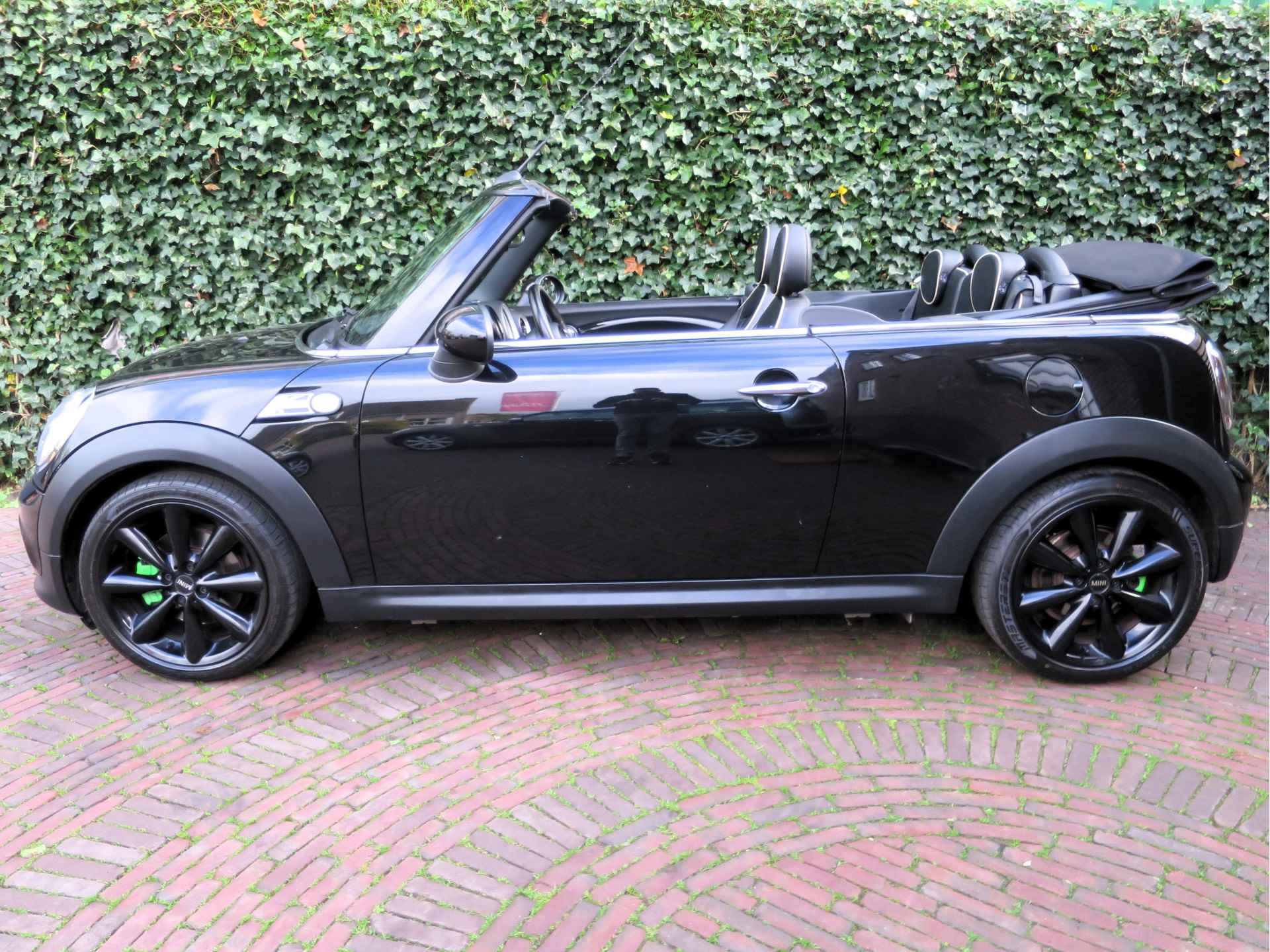 MINI Cabrio 1.6 Cooper Chili R57 LCI met Leder, Navi, BT, Xenon en 17" - 33/56