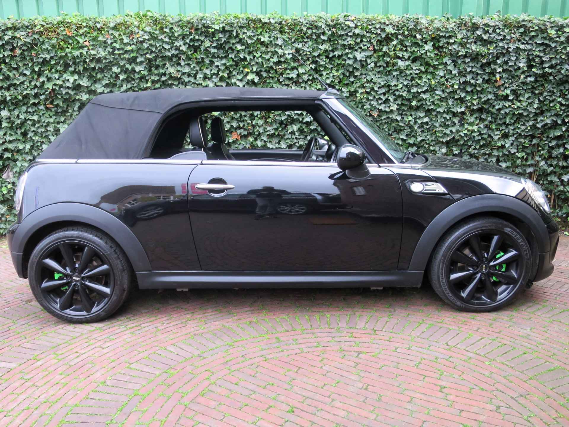 MINI Cabrio 1.6 Cooper Chili R57 LCI met Leder, Navi, BT, Xenon en 17" - 43/56