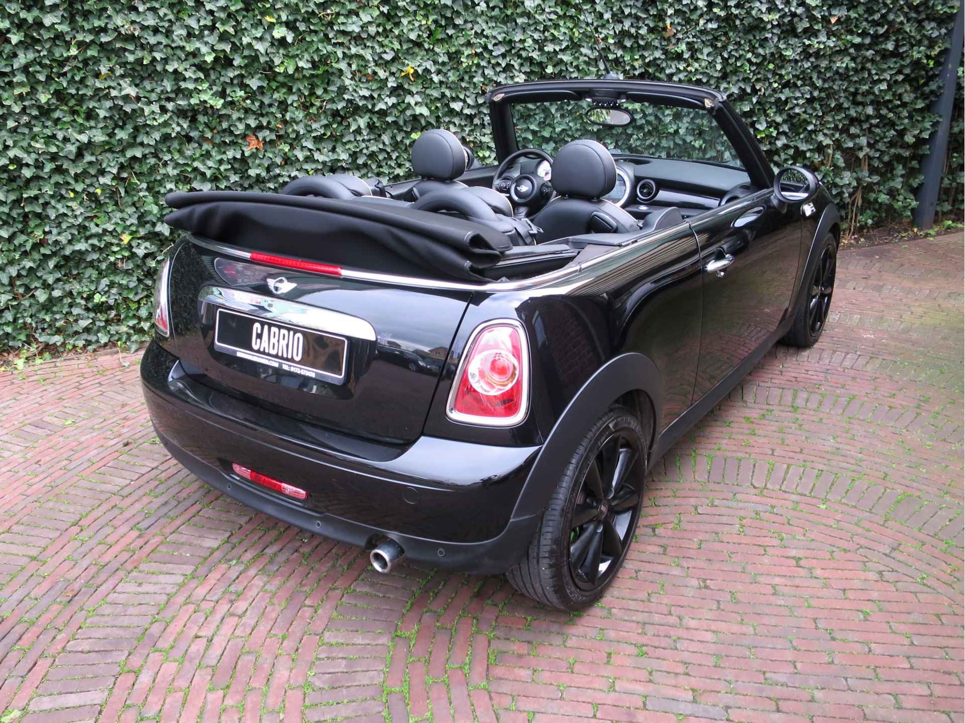 MINI Cabrio 1.6 Cooper Chili R57 LCI met Leder, Navi, BT, Xenon en 17" - 54/56