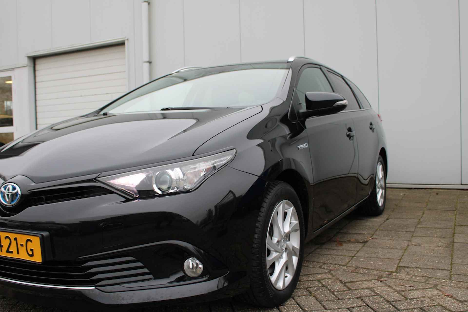 Toyota Auris Touring Sports 1.8 Hybride Energy Plus TS - 12/29