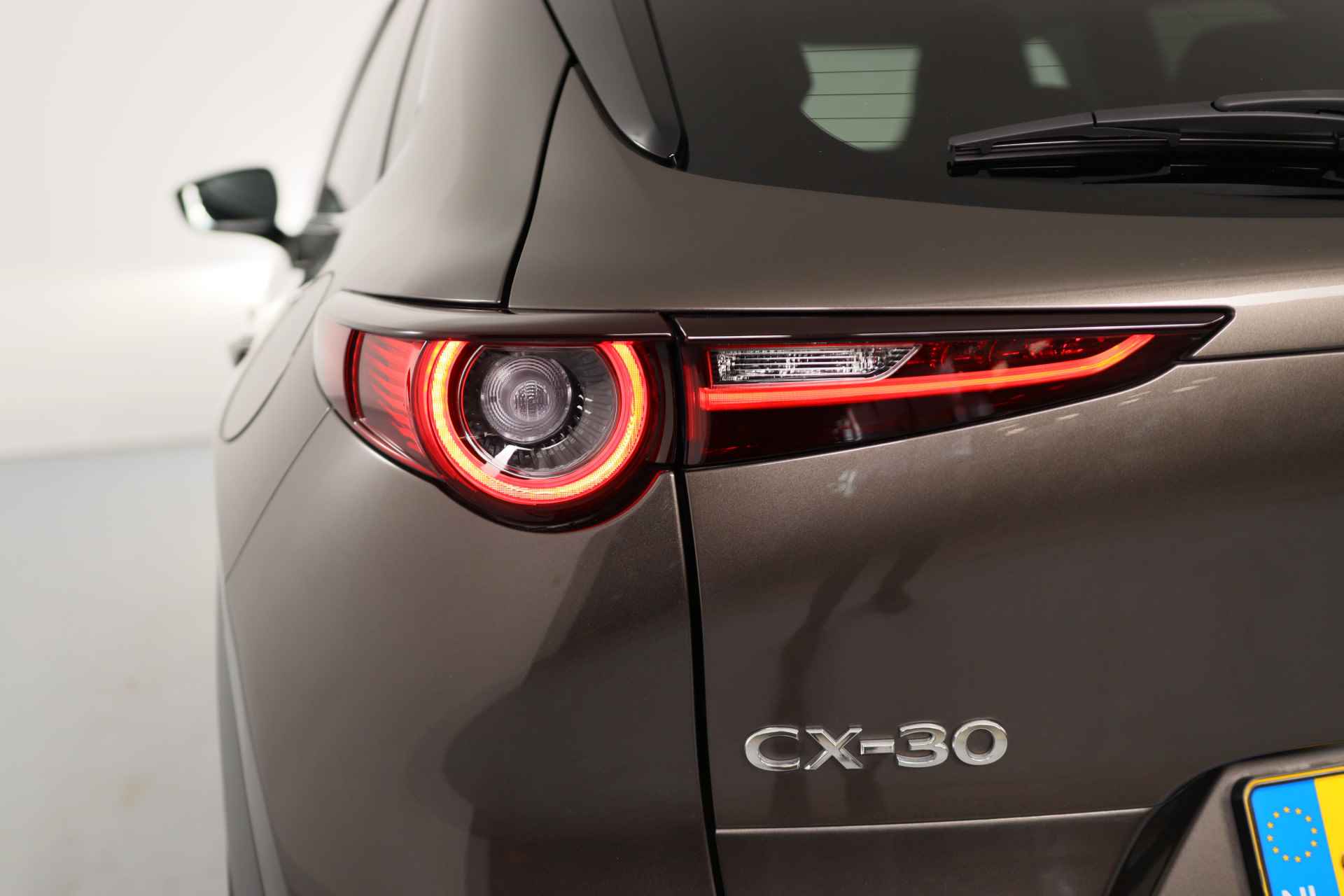 Mazda CX-30 2.0 e-SkyActiv-X M Hybrid Luxury | Leder | Trekhaak | Camera | Stoel-/stuurverwarming | Elektr achterklep | Elektr stoel | 18 in - 28/41