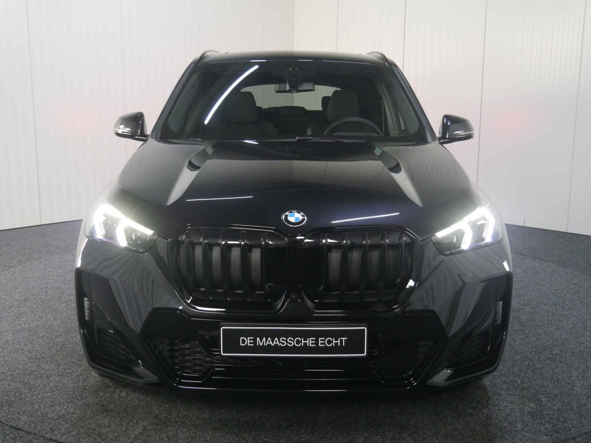 BMW X1 sDrive18i High Executive M Sport Automaat / Panoramadak / Trekhaak / Verwarmd stuurwiel / Sportstoelen / Stoelverwarming / Adaptieve LED / Harman Kardon / Head-Up - 7/30