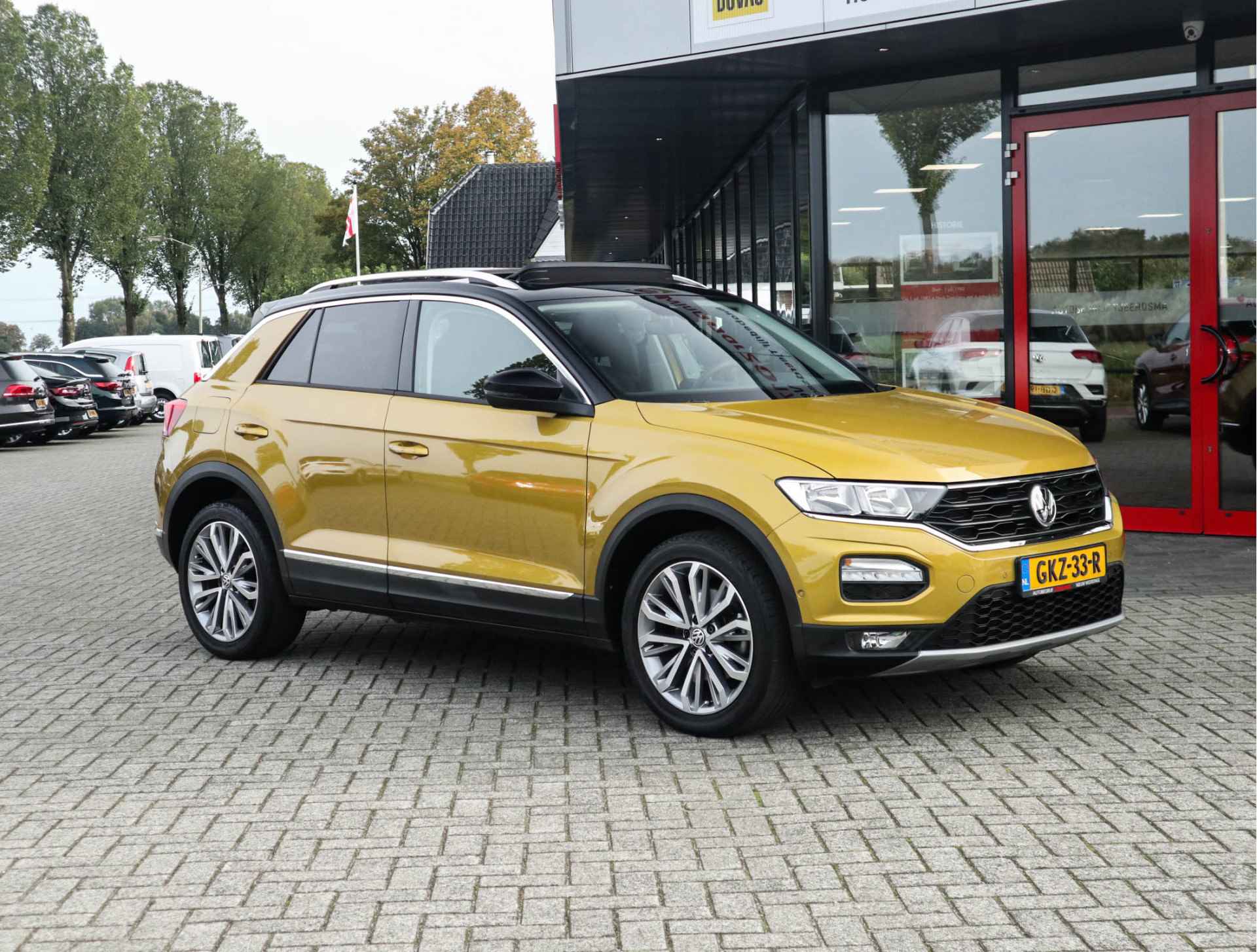 Volkswagen T-Roc 1.0 TSI Style Navi/Clima/Panodak/Adapt.Cruise/PDC/Trekhaak - 12/34