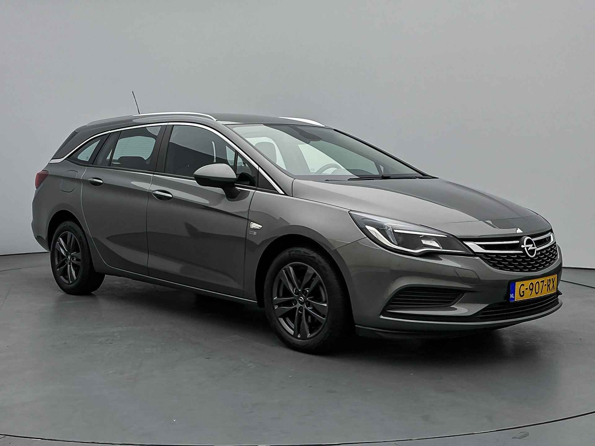 Opel Astra SW 120 Jaar Edition 105 pk | Navigatie | Airco | Cruise Control | LED Dagrijverlichting | Lederen Stuurwiel | Start/Stop Systeem | Bluetooth | Centrale Deurvergrendeling met Afstandsbediening | 16" Lichtmetalen Velgen | Apple Carplay/Android Auto | - 4/36