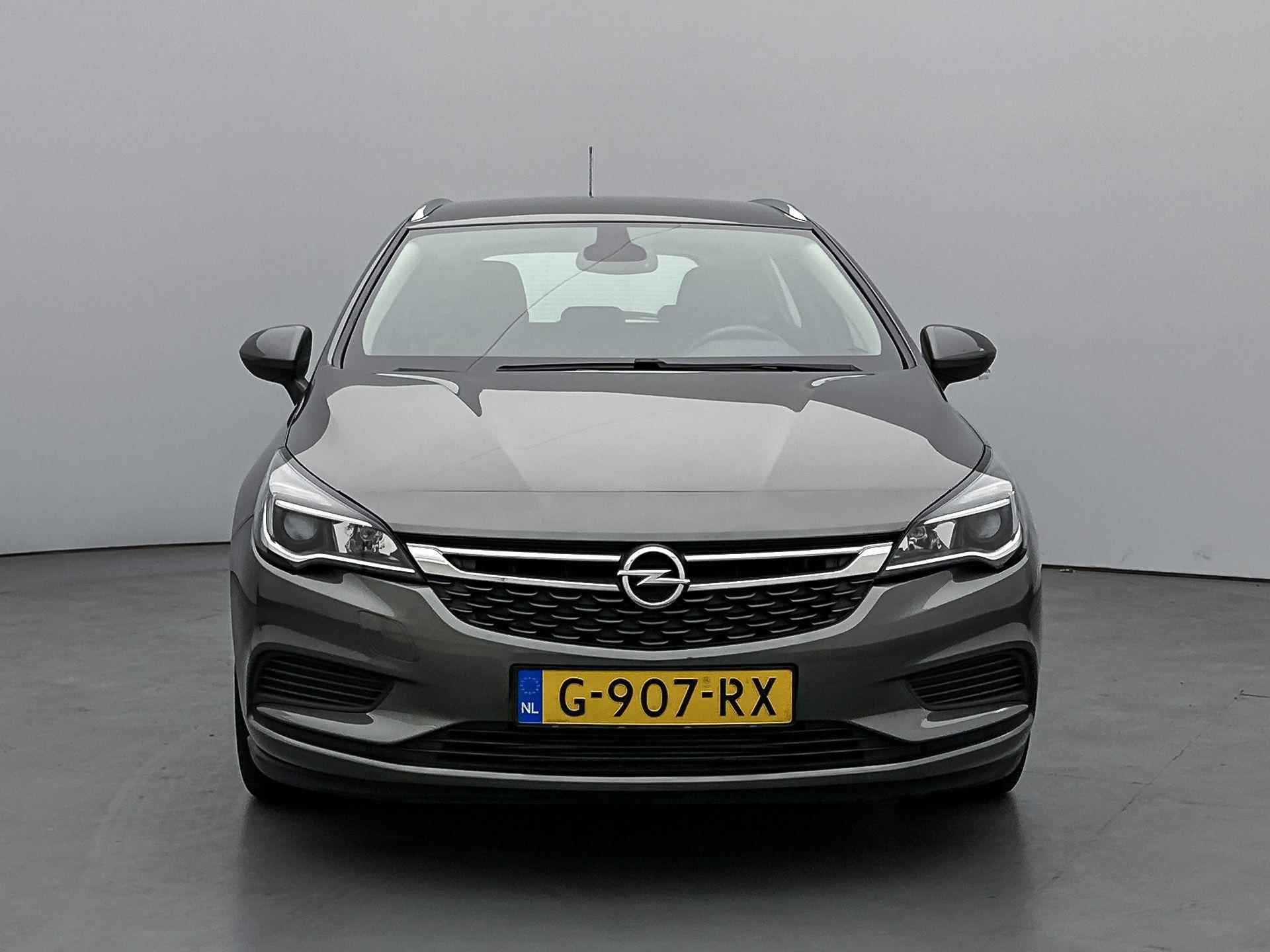 Opel Astra SW 120 Jaar Edition 105 pk | Navigatie | Airco | Cruise Control | LED Dagrijverlichting | Lederen Stuurwiel | Start/Stop Systeem | Bluetooth | Centrale Deurvergrendeling met Afstandsbediening | 16" Lichtmetalen Velgen | Apple Carplay/Android Auto | - 5/36