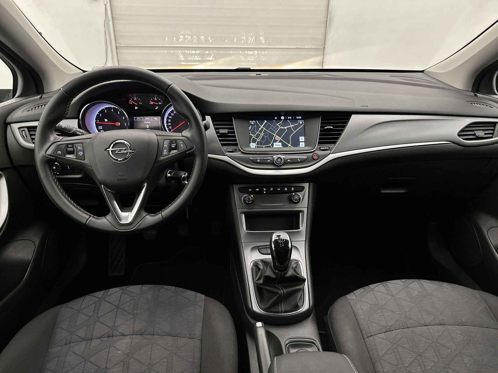 Opel Astra SW 120 Jaar Edition 105 pk | Navigatie | Airco | Cruise Control | LED Dagrijverlichting | Lederen Stuurwiel | Start/Stop Systeem | Bluetooth | Centrale Deurvergrendeling met Afstandsbediening | 16" Lichtmetalen Velgen | Apple Carplay/Android Auto | - 12/36