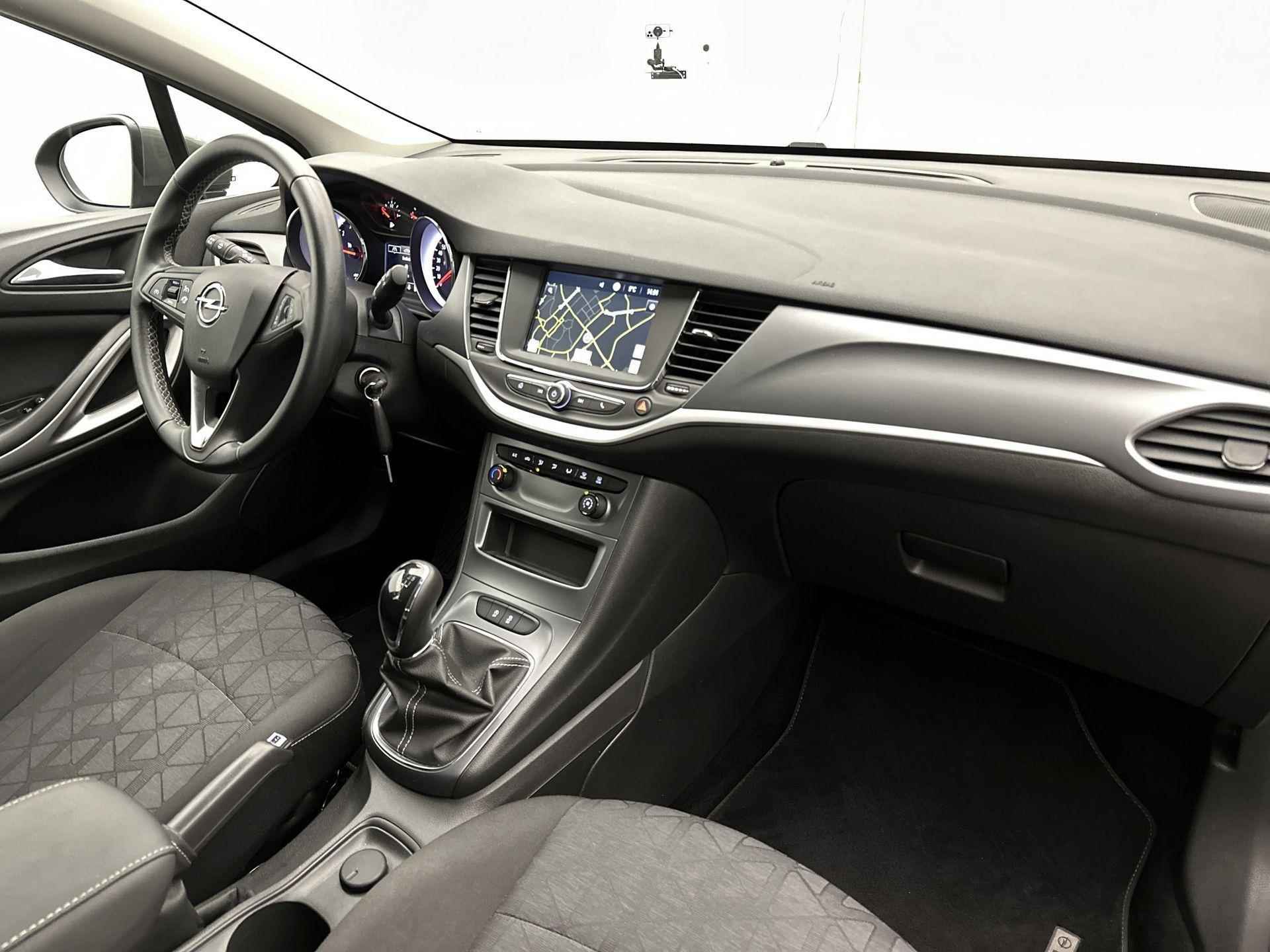 Opel Astra SW 120 Jaar Edition 105 pk | Navigatie | Airco | Cruise Control | LED Dagrijverlichting | Lederen Stuurwiel | Start/Stop Systeem | Bluetooth | Centrale Deurvergrendeling met Afstandsbediening | 16" Lichtmetalen Velgen | Apple Carplay/Android Auto | - 29/36