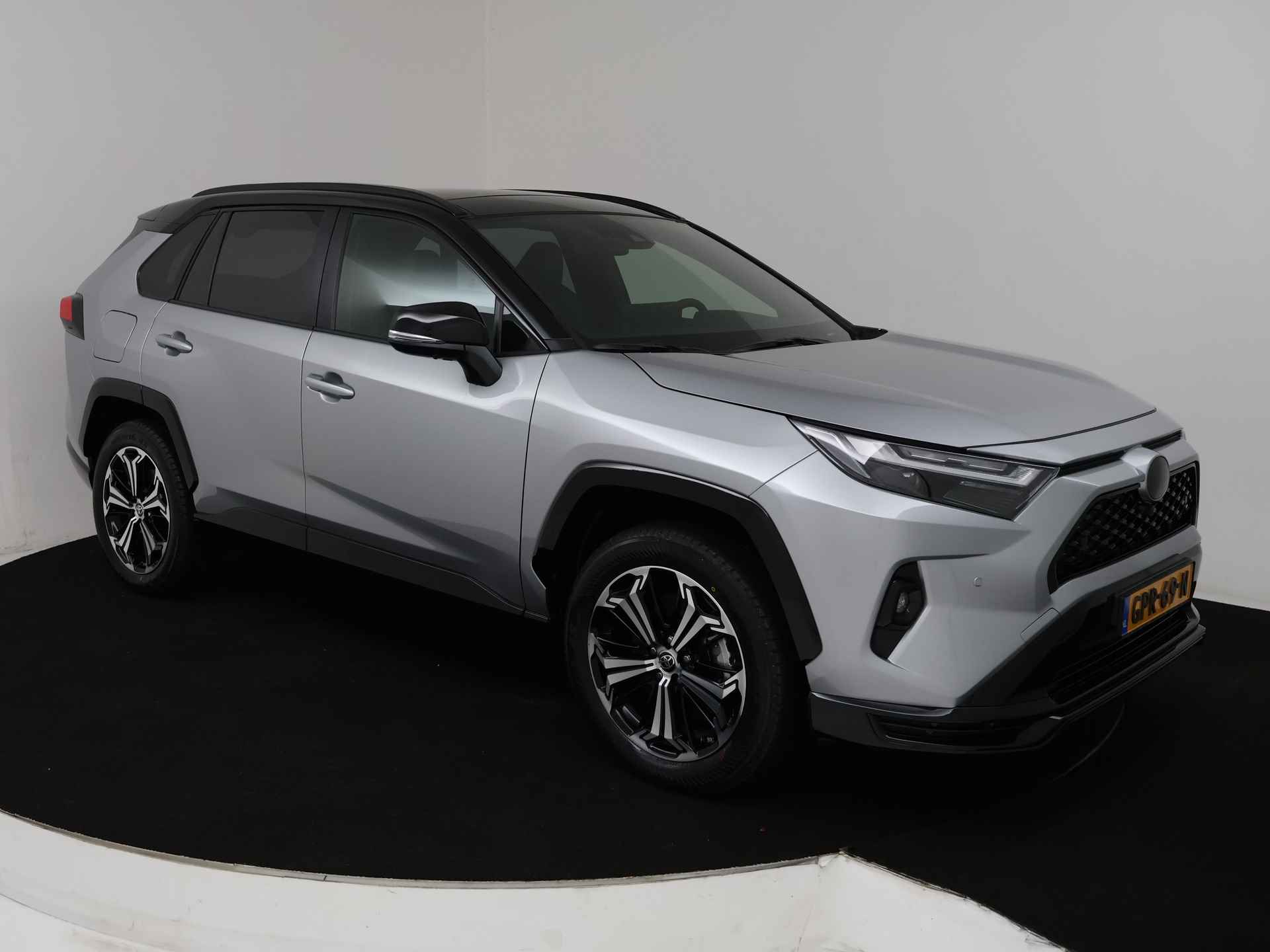 Toyota RAV4 2.5 Plug-in Hybrid AWD Bi-Tone Plus | Panoramisch schuif-/kanteldak | Trekhaak | - 28/45