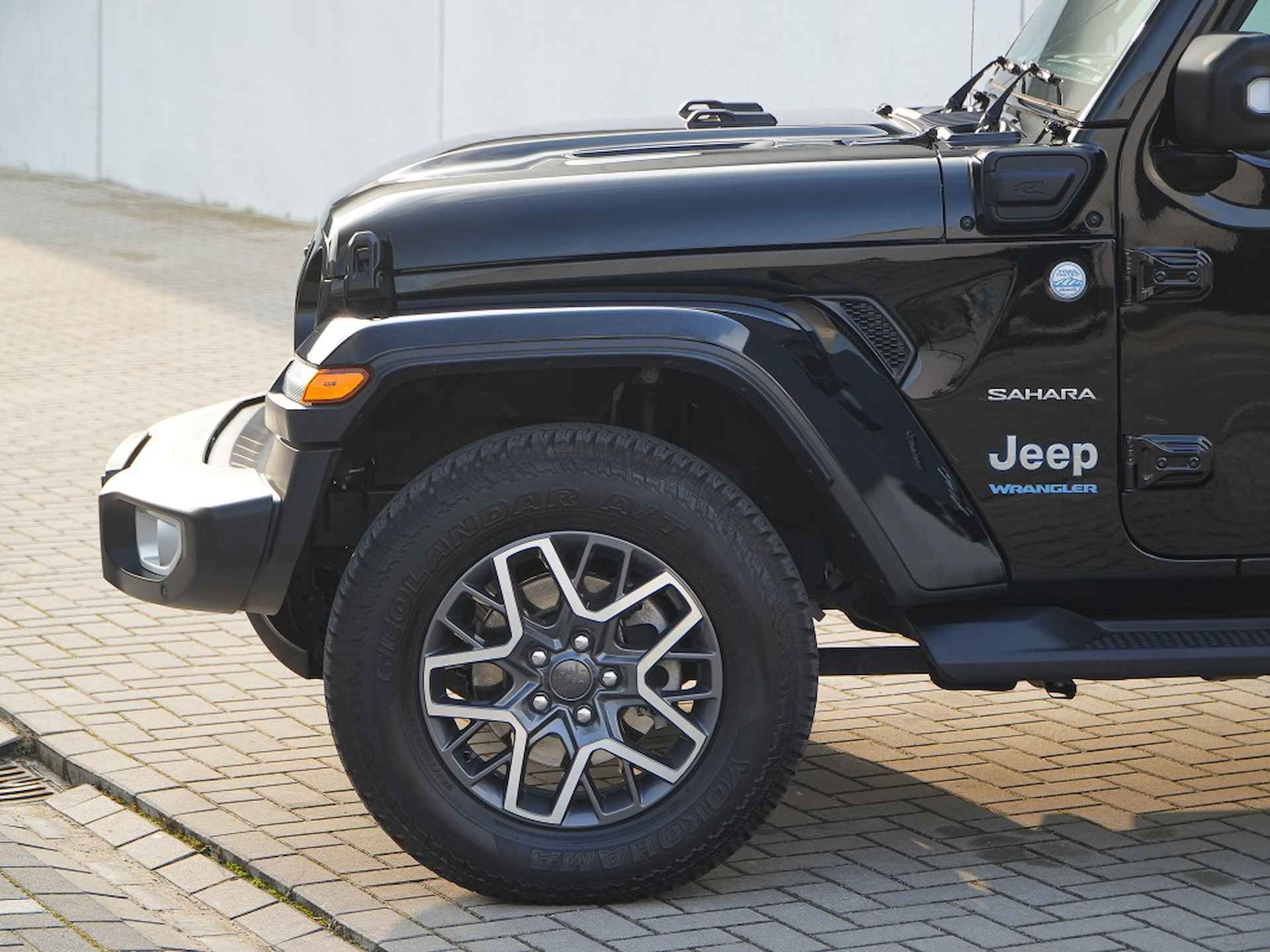 Jeep Wrangler Unlimited  4xe 380 PK Sahara | Leder | Camera | Navi | 18" - 9/35