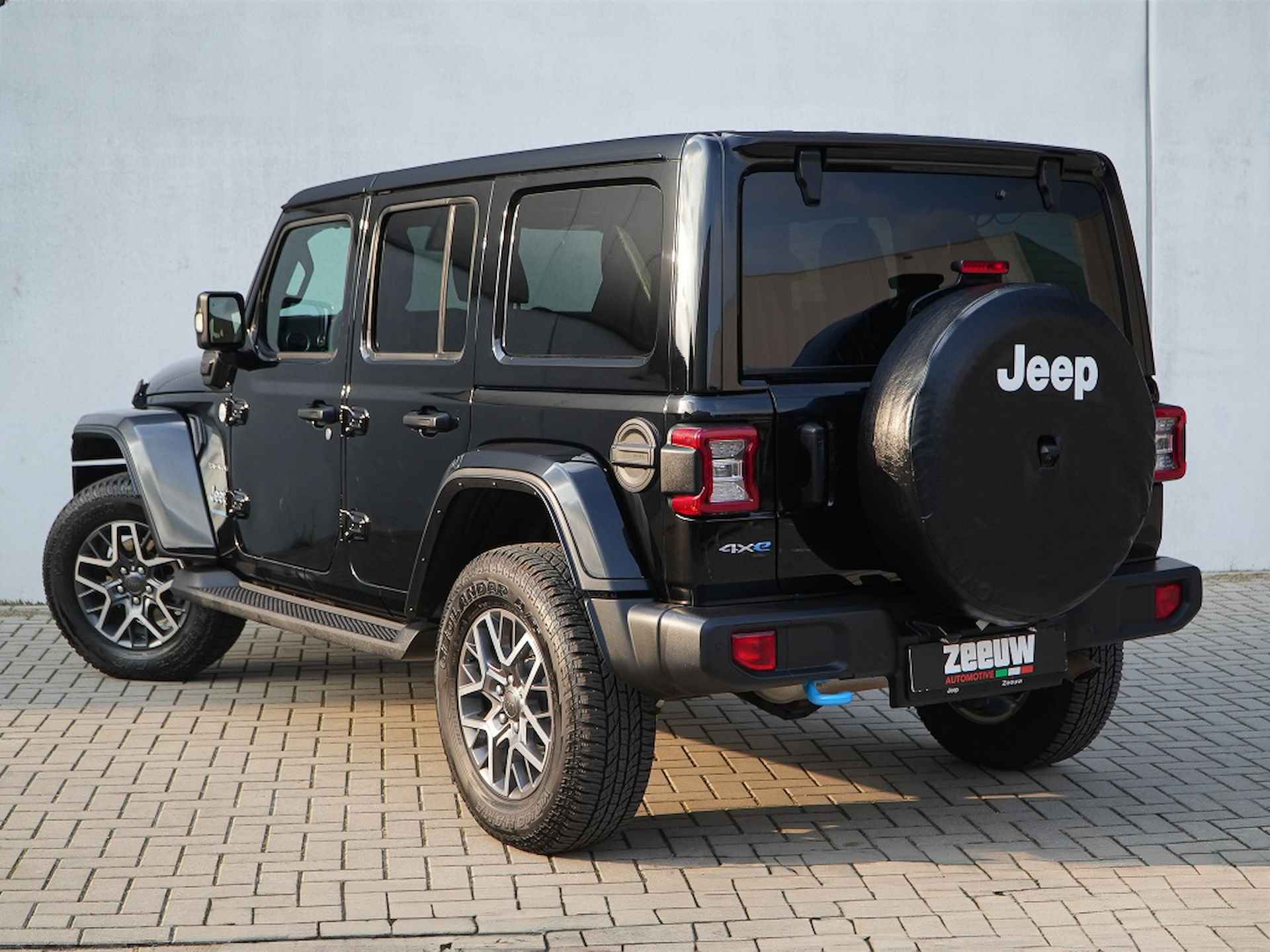 Jeep Wrangler Unlimited  4xe 380 PK Sahara | Leder | Camera | Navi | 18" - 12/35