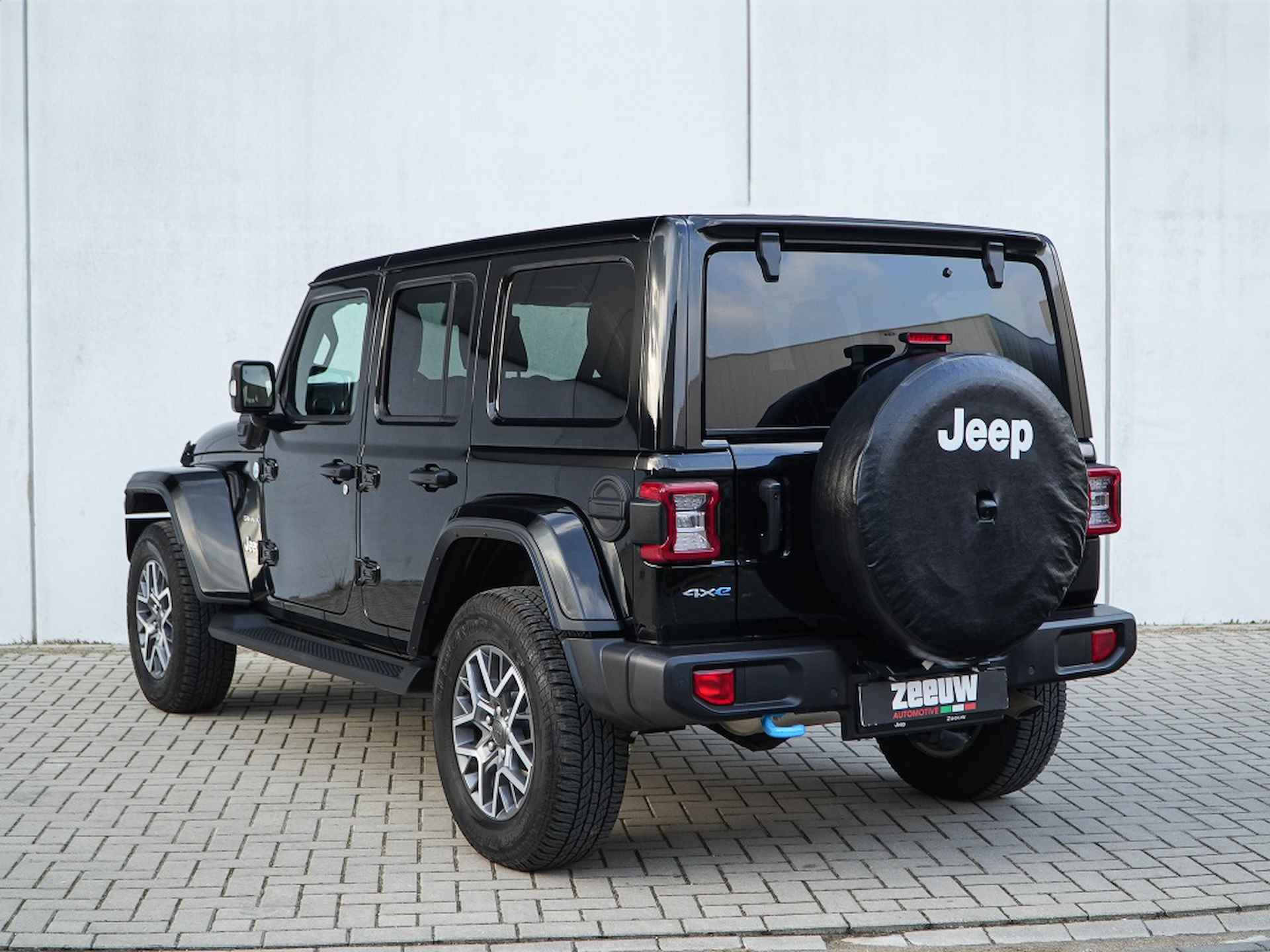 Jeep Wrangler Unlimited  4xe 380 PK Sahara | Leder | Camera | Navi | 18" - 19/35