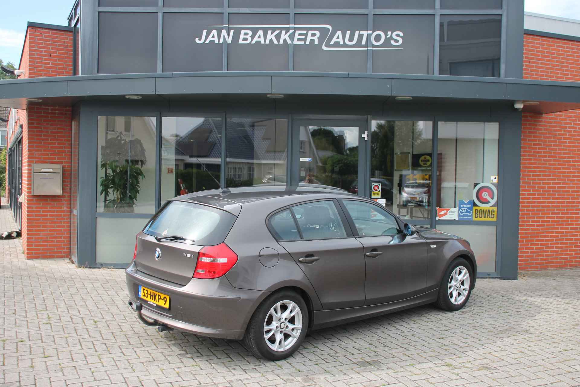 BMW 1-serie 118i Business Line | AC | Cruise | Rijklaar | 1 Jaar Garantie - 4/19