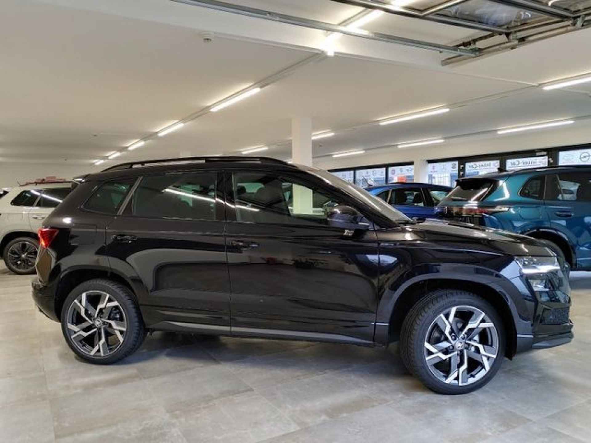 SKODA Karoq 2.0 TSI DSG SPORTLINE 4X4 PANO-DAK/TREKHAAK/CAMERA/ACC/STOELVERW - 3/17