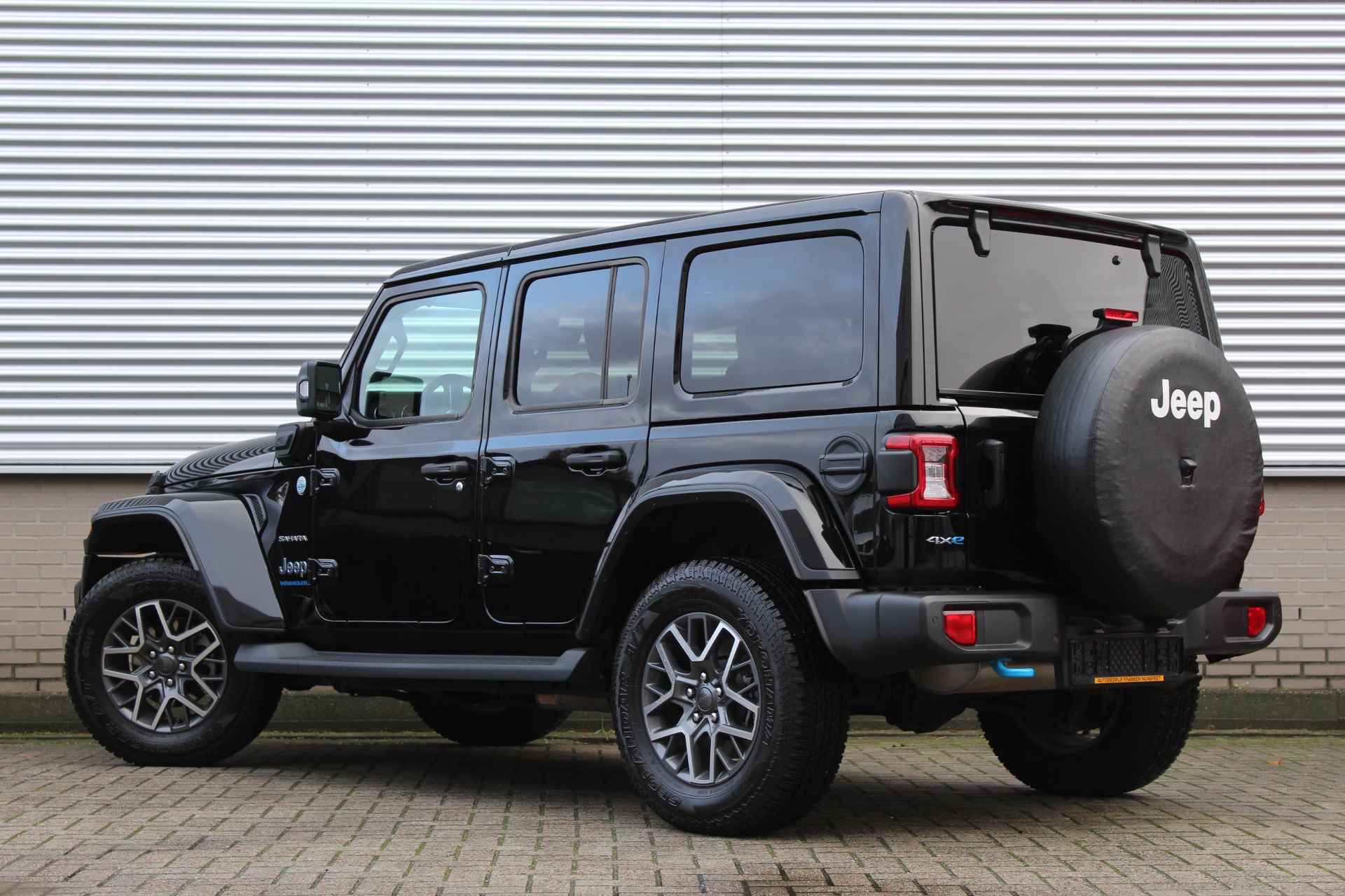 Jeep Wrangler 4xe 380 Sahara unlimited | Dual Top | Full Options | Alpine | Adaptieve Cruise | BLIS | Leder - 3/55