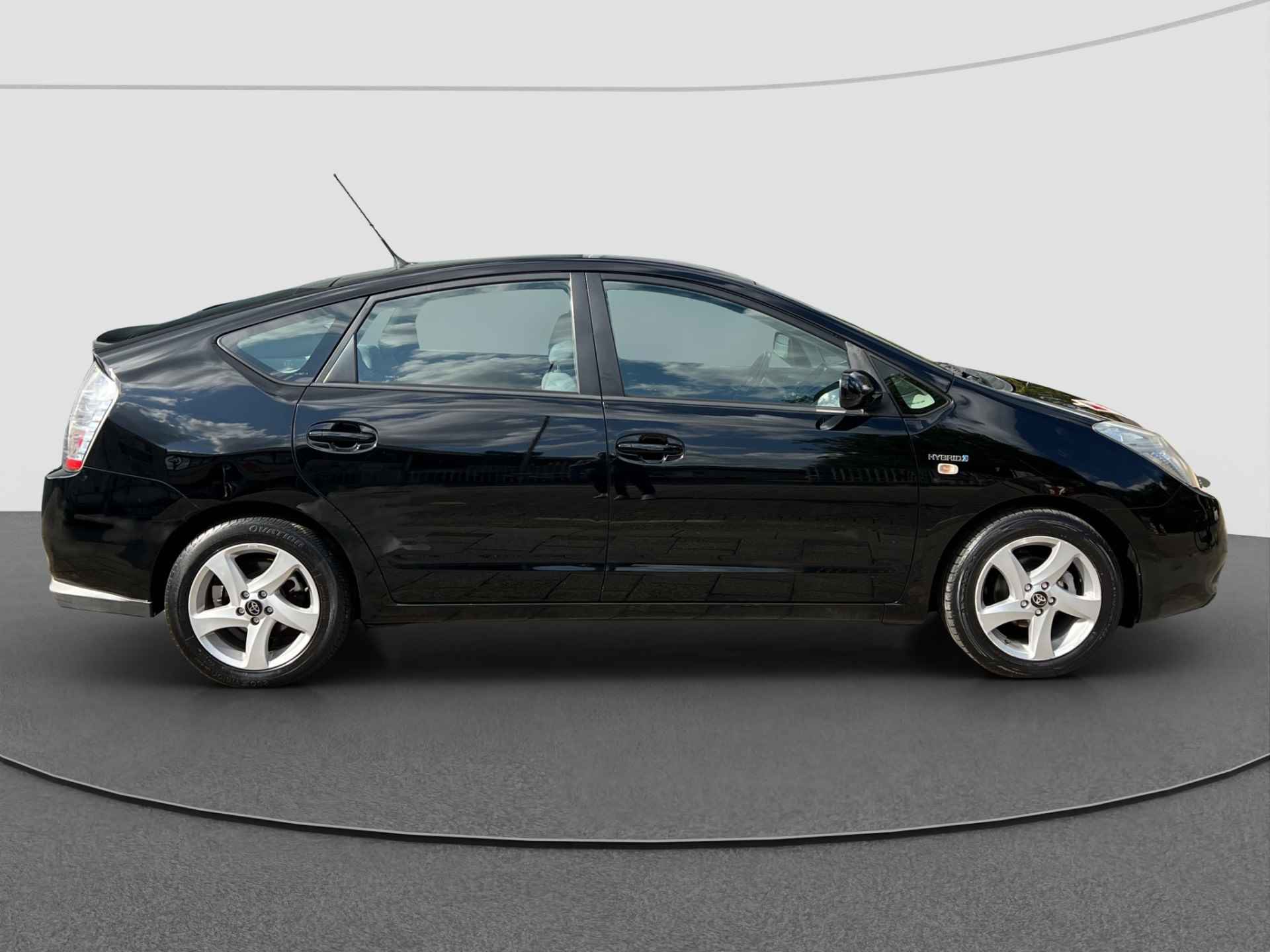 Toyota Prius 1.5 VVT-i Tech | Navi | Cruise | Fietsbeugel - 9/28