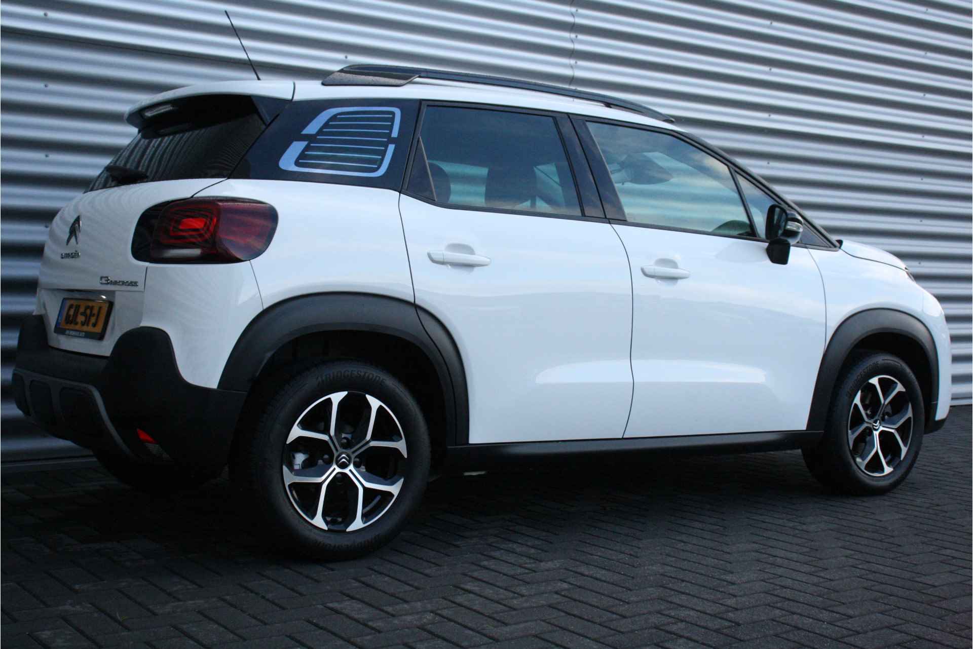 Citroën C3 Aircross 1.2 PURETECH 130PK SHINE AUTOMAAT / NAVI / LEDER / CLIMA / LED / 16" LMV / PDC / BLUETOOTH / CRUISECONTROL / 1E EIGENAAR / NIEUW - 7/34