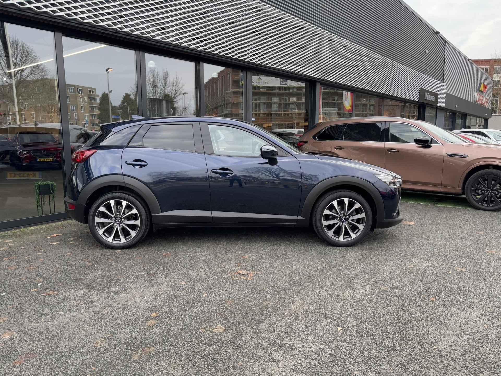 Mazda CX-3 2.0 SkyActiv-G 121 Sportive /Afn. Trekhaak/Dealeronderhouden/Navi/Airco/DAB/PDC achter - 2/30