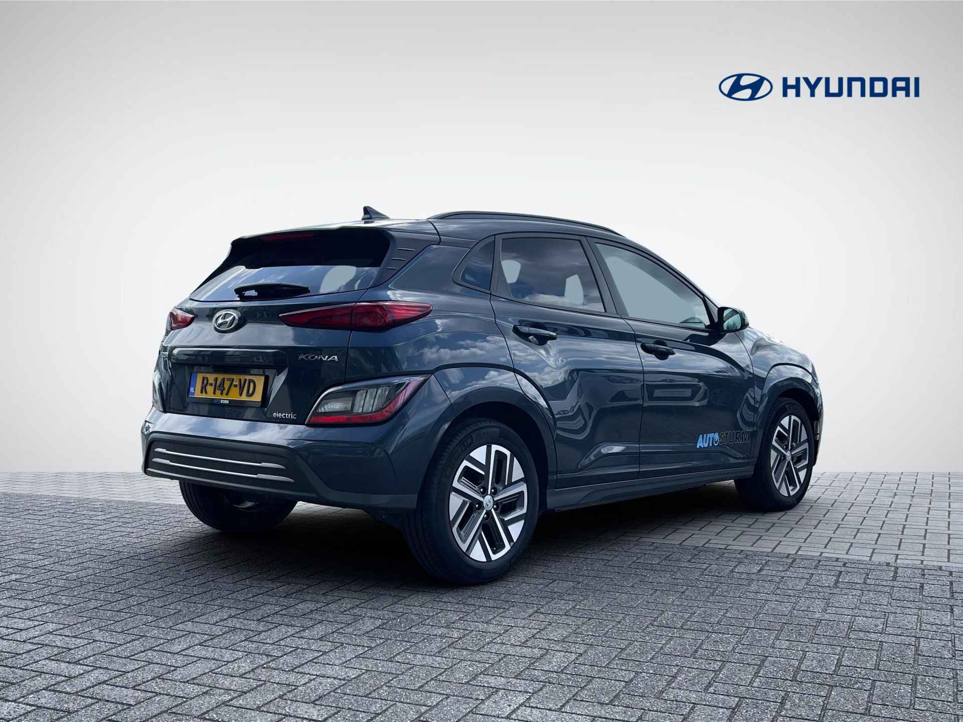 Hyundai Kona EV Fashion 39 kWh *SUBSIDIE MOGELIJK* | Head-Up Display | Adapt. Cruise Control | Premium Audio | Navigatie | Camera | Rijklaarprijs! - 3/24
