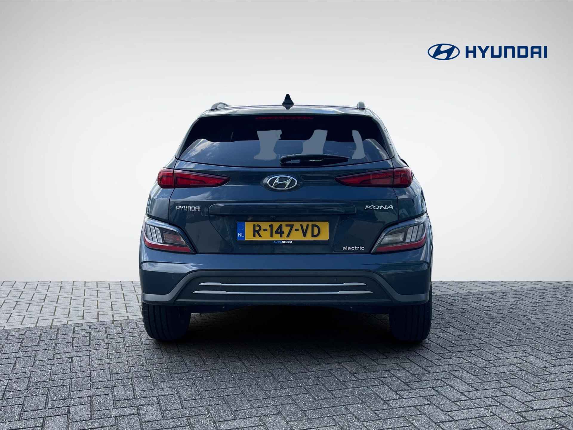 Hyundai Kona EV Fashion 39 kWh *SUBSIDIE MOGELIJK* | Head-Up Display | Adapt. Cruise Control | Premium Audio | Navigatie | Camera | Rijklaarprijs! - 5/24