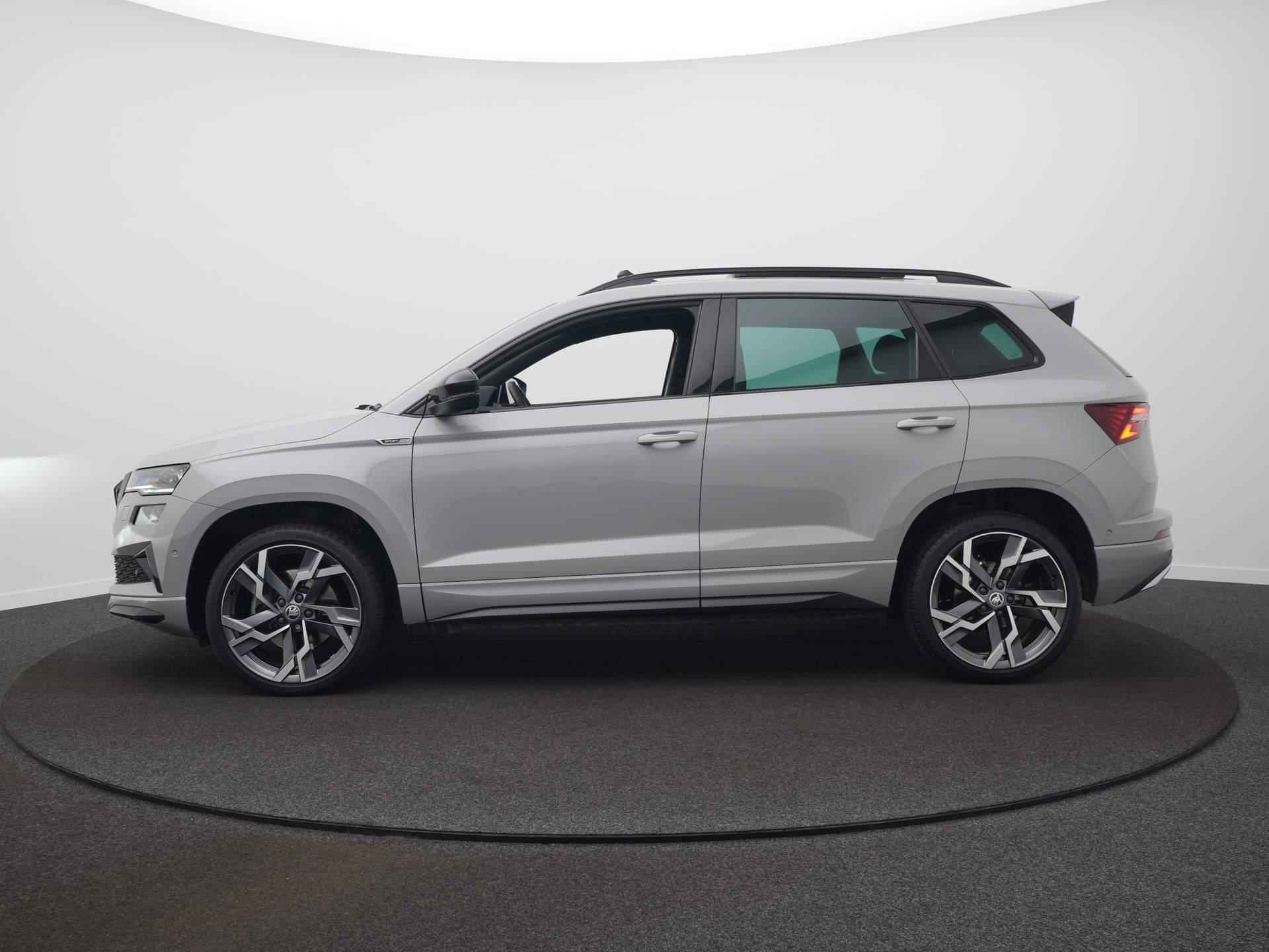 Skoda Karoq 1.5 TSI ACT Sportline Business / Panoramadak / Elektr. Trekhaak / Stoel en Stuurverwarming - 8/66