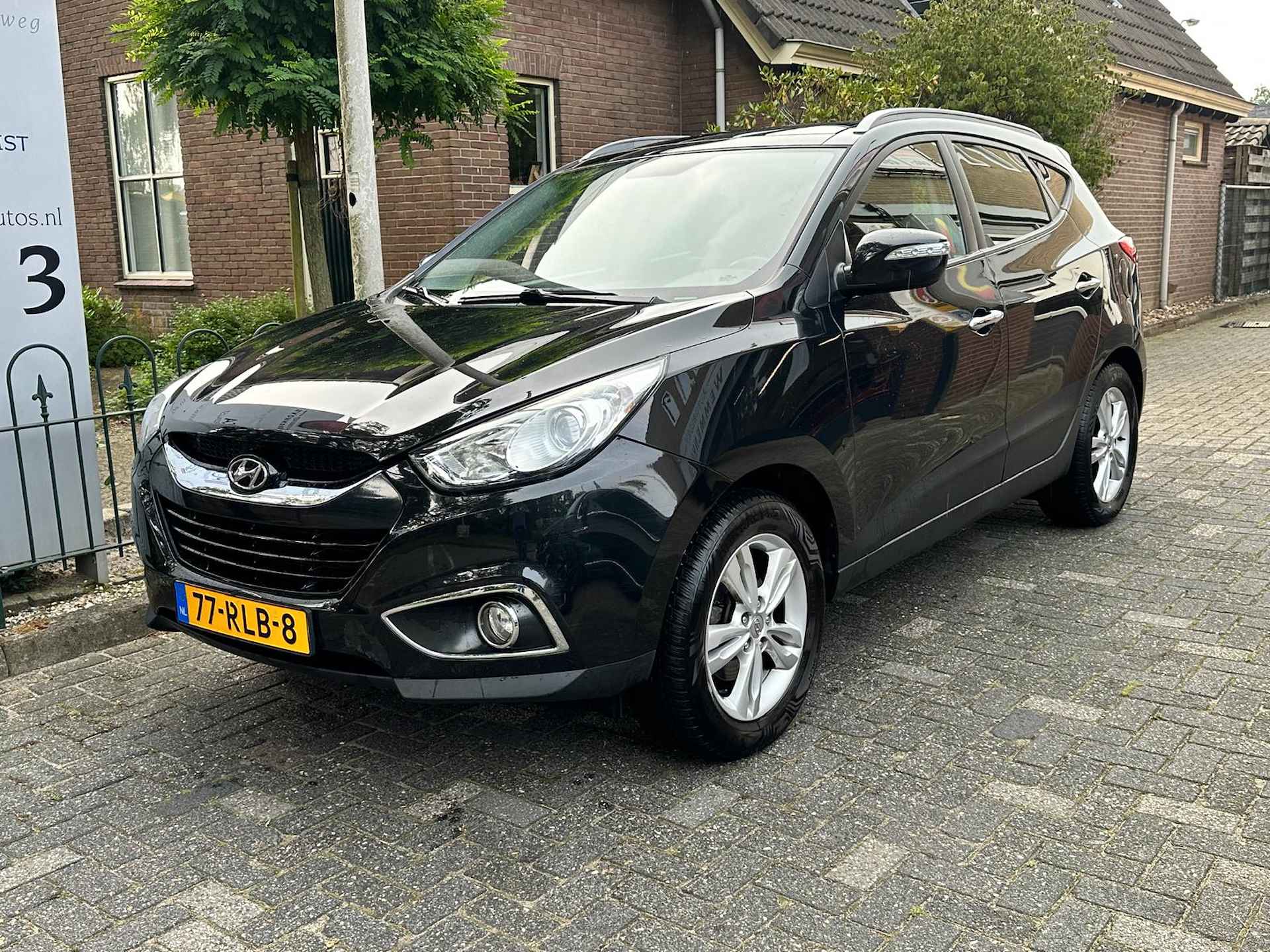 Hyundai ix35 2.0i 4WD Business Edition Leer/Automaat/Alu wielen/El.ramen/Navigatie - 4/46