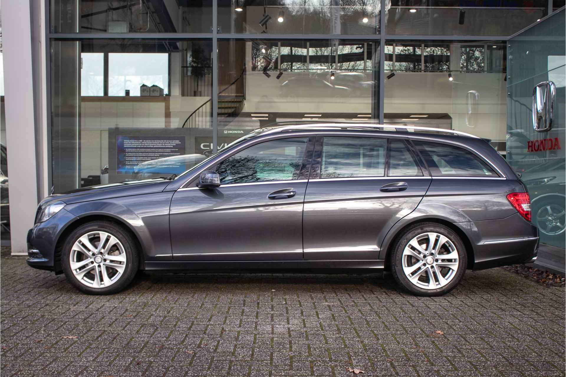 Mercedes-Benz C-Klasse Estate 180 Prestige Avantgarde Automaat All-in rijklaarprijs | Navi | Leder | Cruise - 2/46