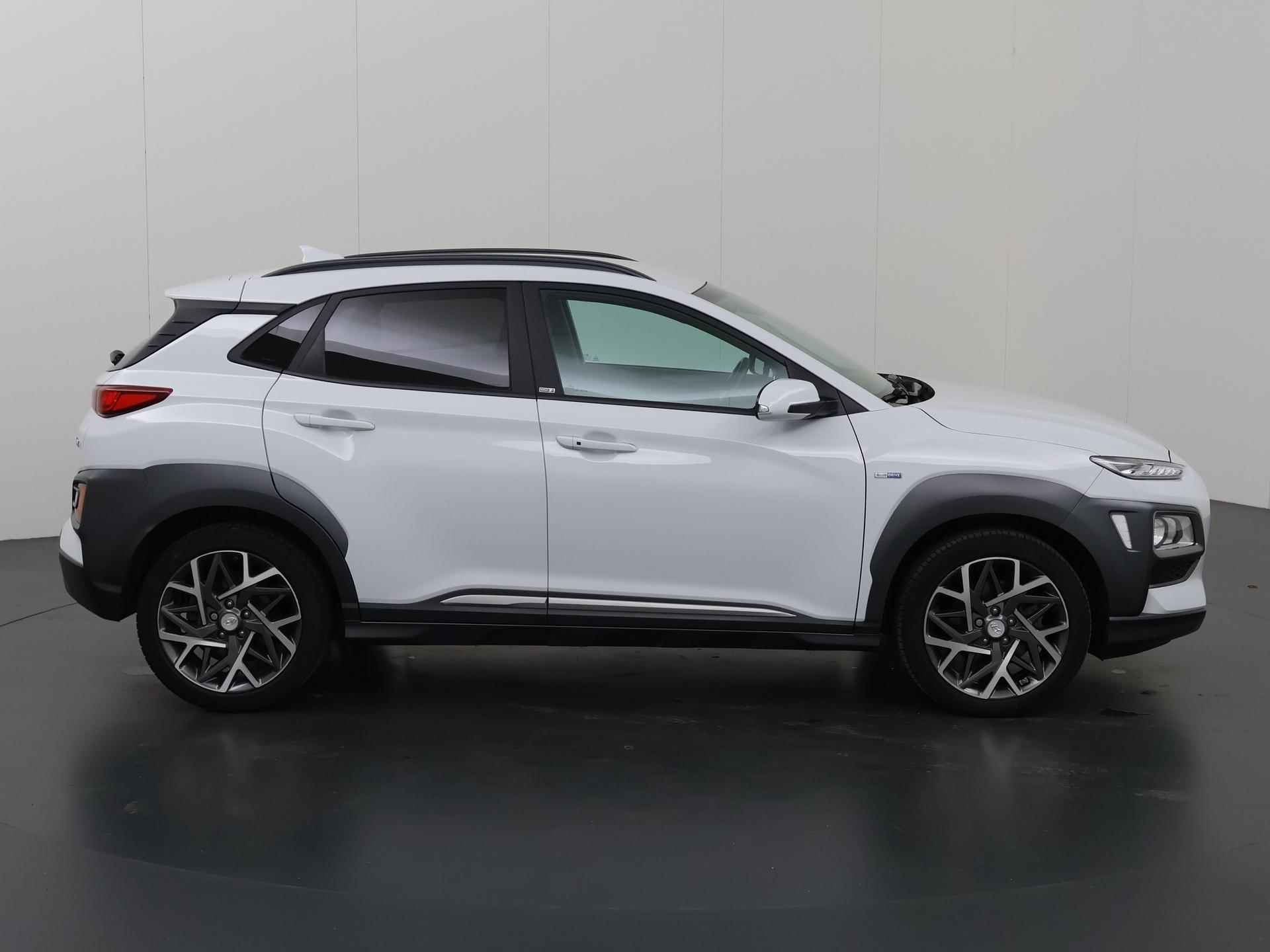 Hyundai Kona 1.6 GDI HEV Fashion | Navigatie | Parkeercamera | Climate Control | Apple carplay | HUD | Dodehoek detectie | Cruise Control | - 7/40