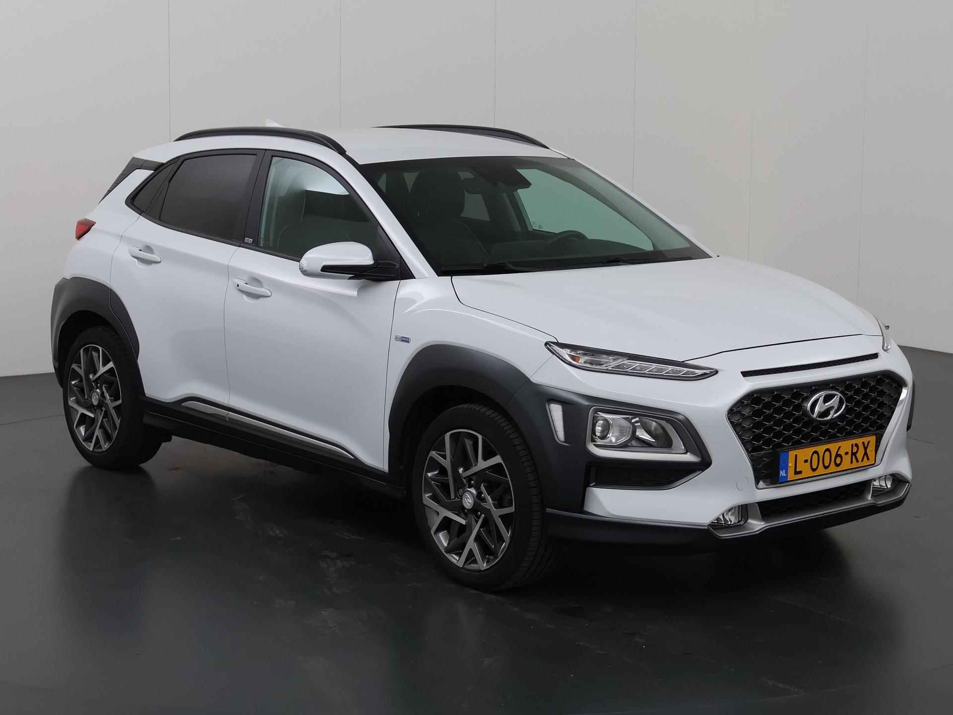 Hyundai Kona 1.6 GDI HEV Fashion | Navigatie | Parkeercamera | Climate Control | Apple carplay | HUD | Dodehoek detectie | Cruise Control | - 24/40