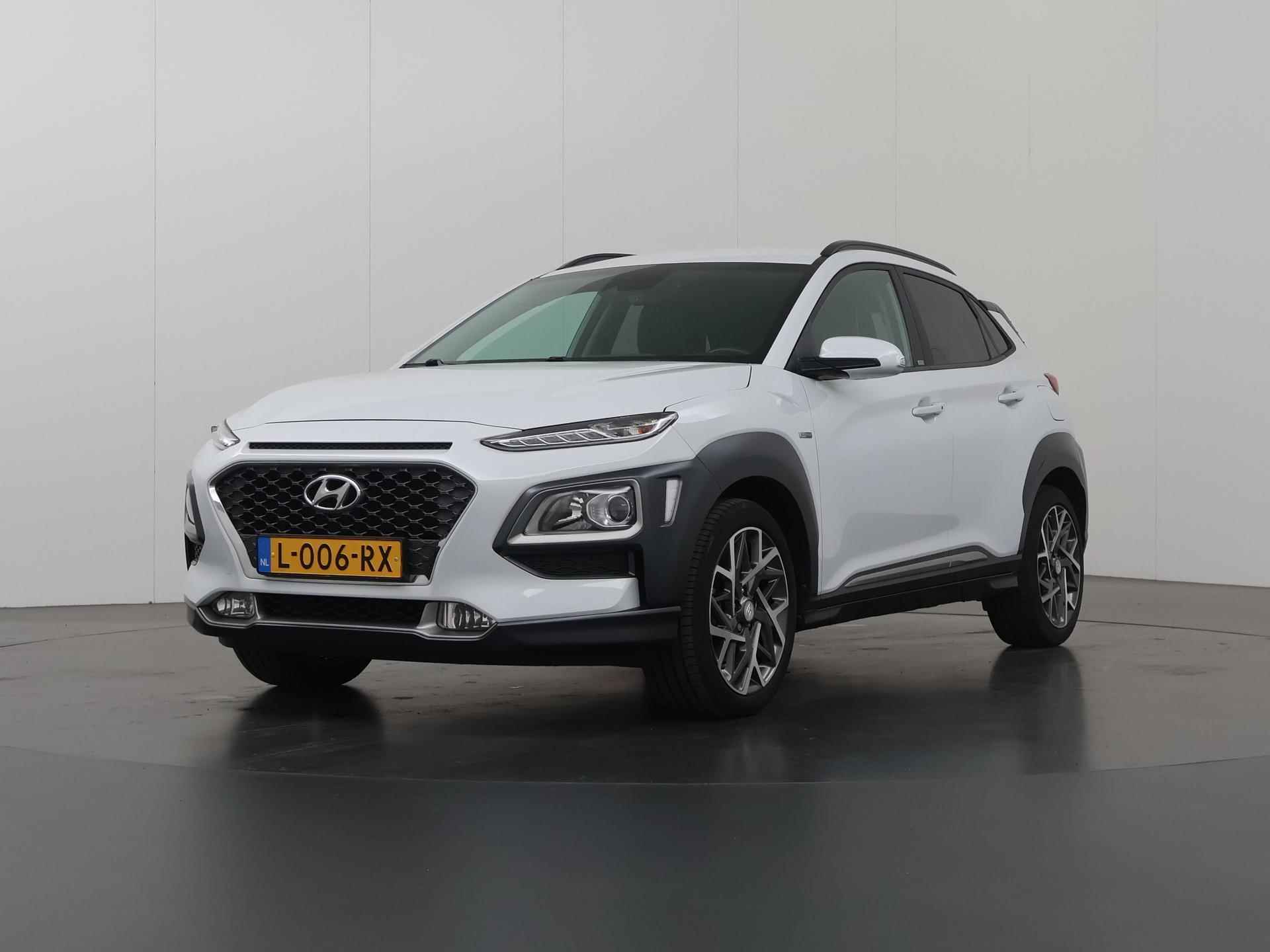 Hyundai Kona 1.6 GDI HEV Fashion | Navigatie | Parkeercamera | Climate Control | Apple carplay | HUD | Dodehoek detectie | Cruise Control | - 40/40