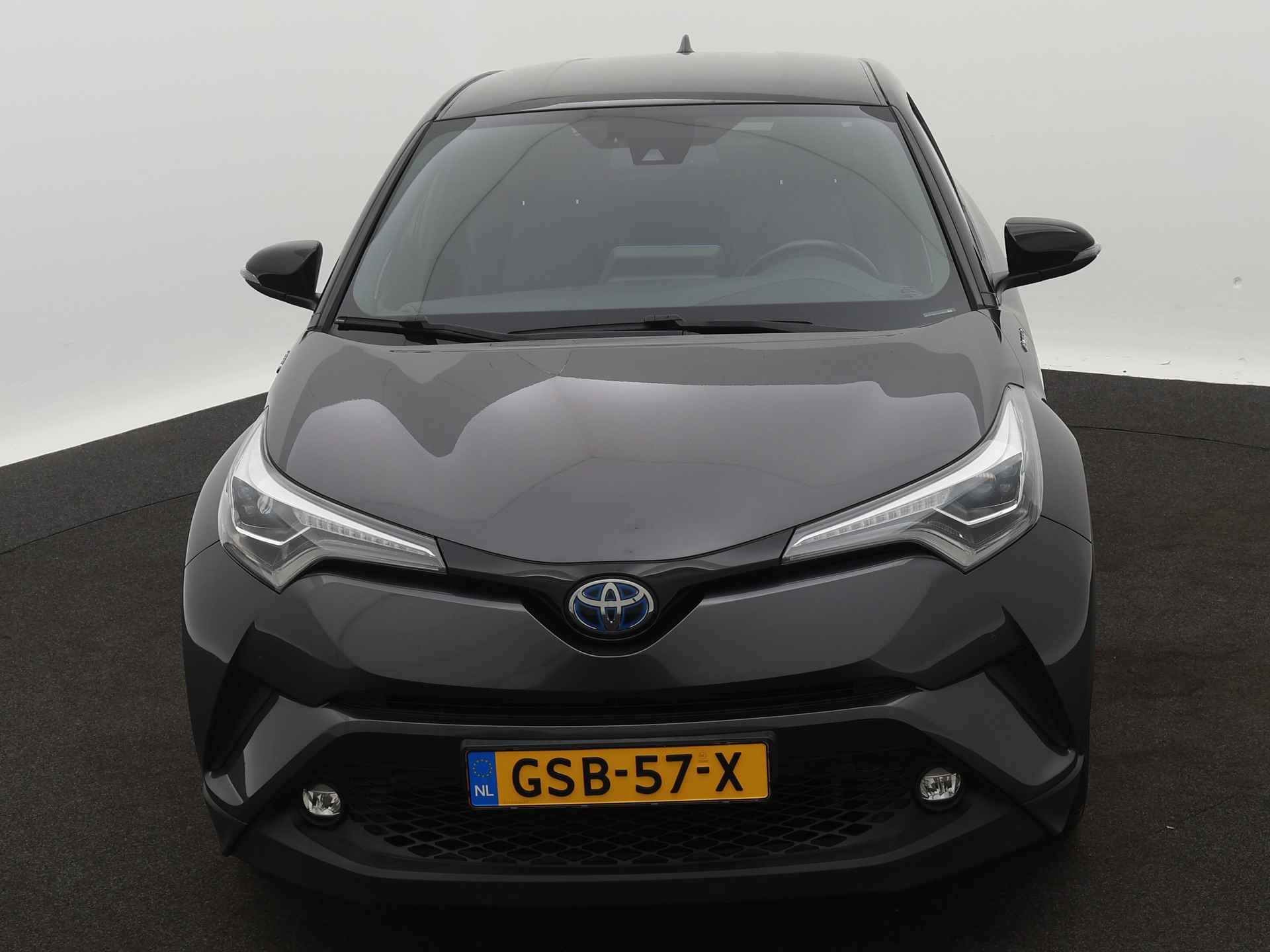 Toyota C-HR 1.8 Hybrid Bi-tone Plus Limited | Navigatie | Camera | LM velgen | Climate Control | Leder | Stoel en stuurwiel verwarmd | - 28/43