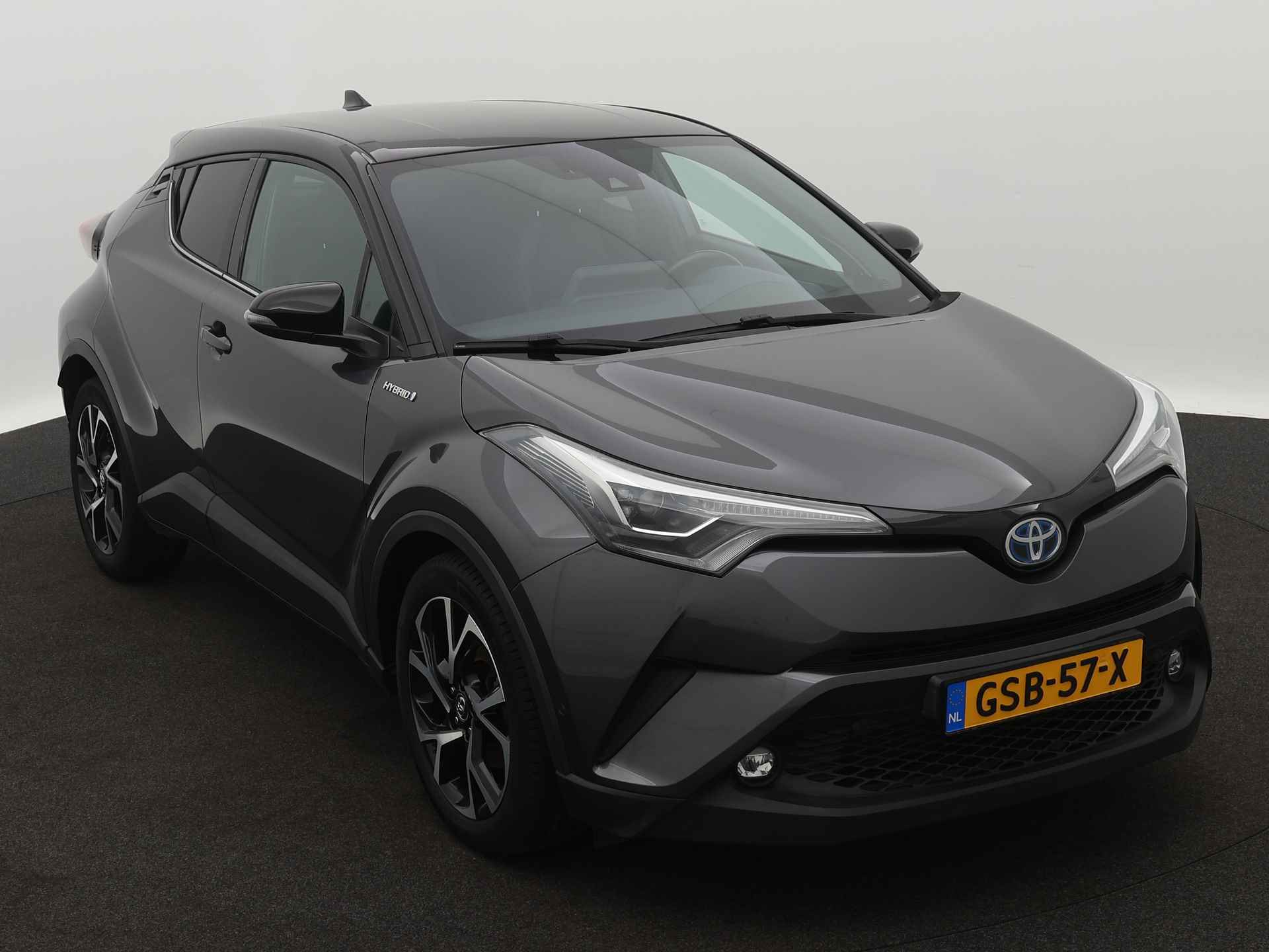 Toyota C-HR 1.8 Hybrid Bi-tone Plus Limited | Navigatie | Camera | LM velgen | Climate Control | Leder | Stoel en stuurwiel verwarmd | - 29/43