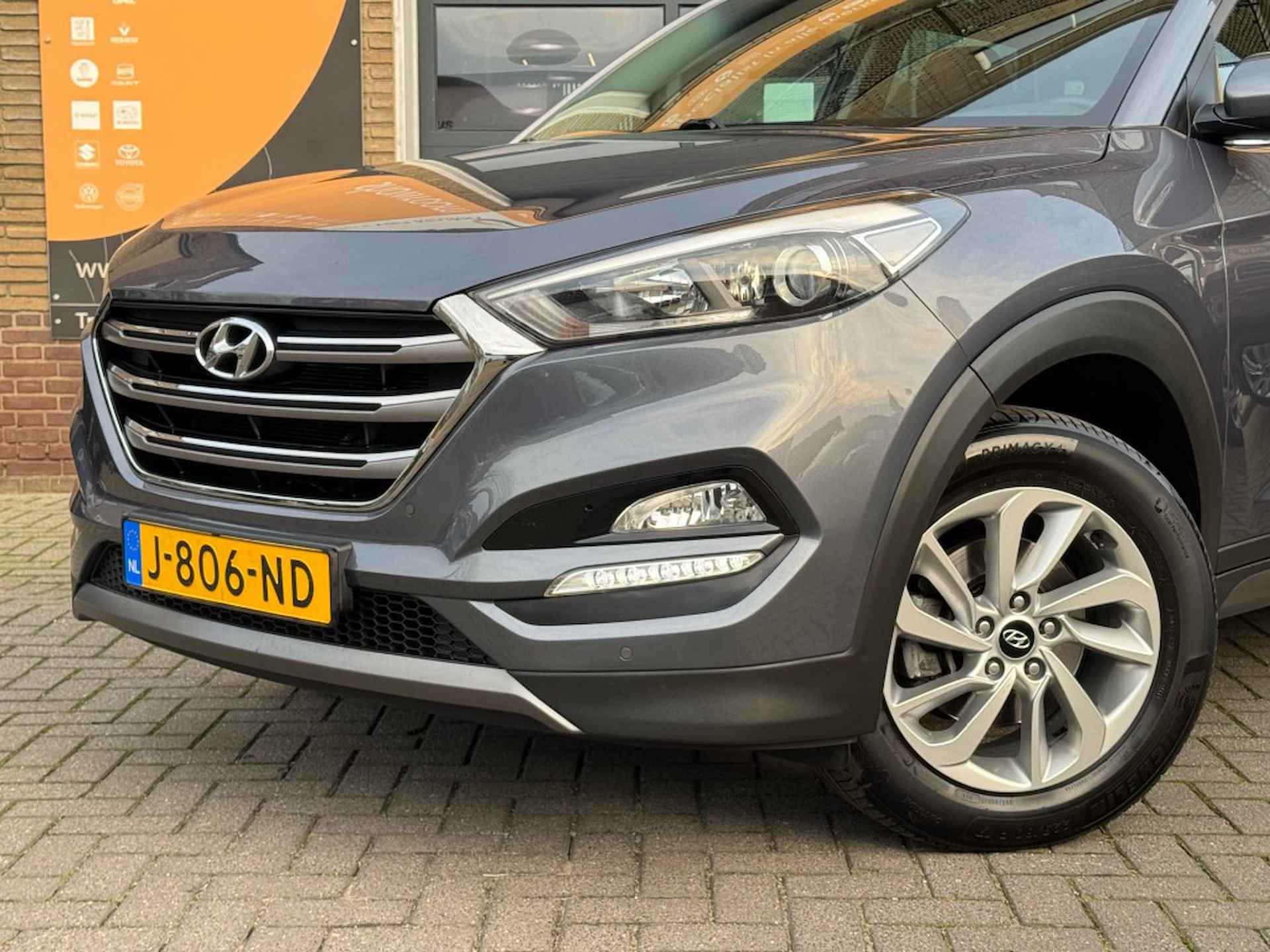 HYUNDAI Tucson 1.6 GDI COMFORT NW.MODEL/NAVI/CAMERA/STOELVERW/LMV/TREKHAAK - 6/44