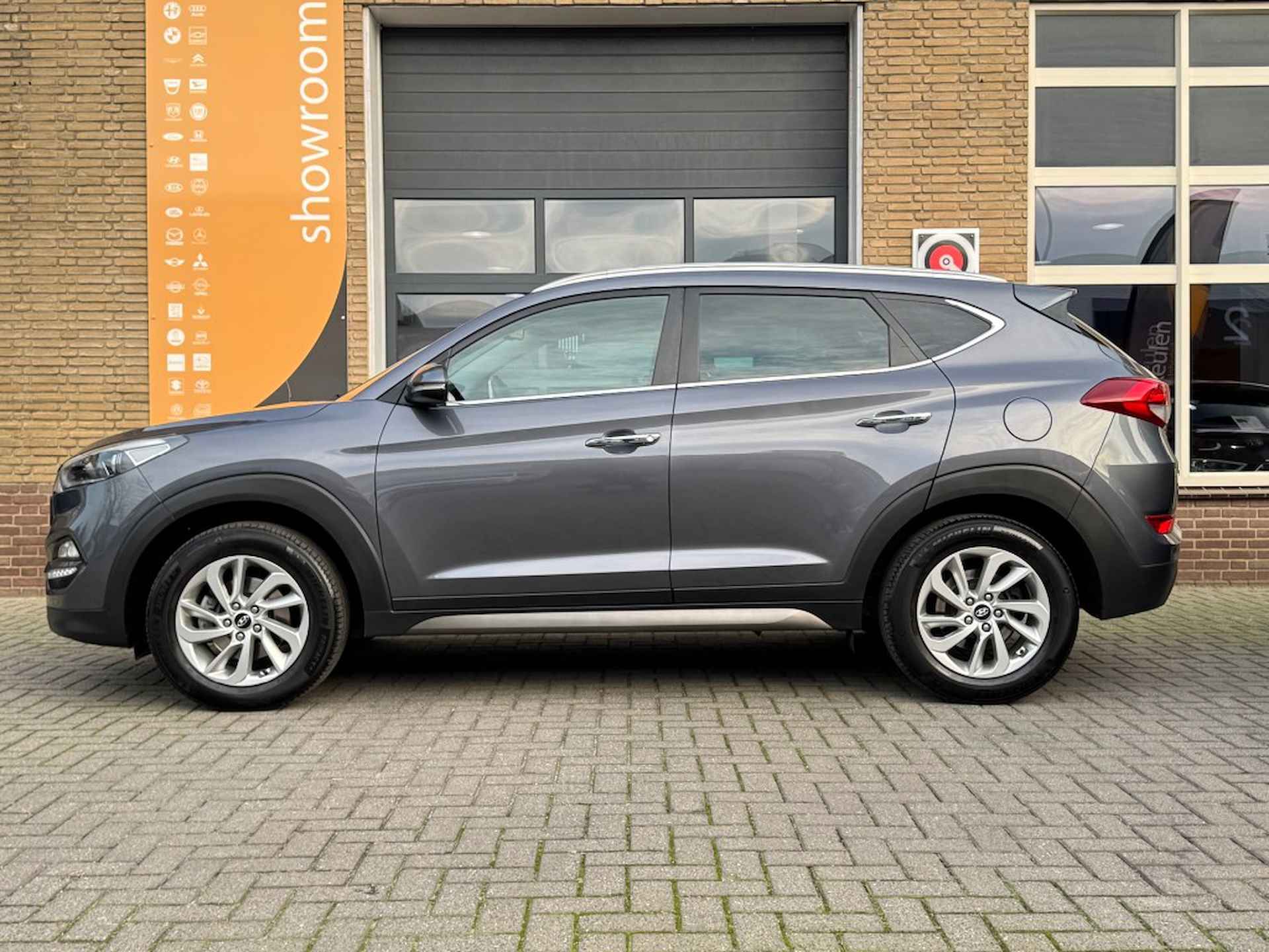 HYUNDAI Tucson 1.6 GDI COMFORT NW.MODEL/NAVI/CAMERA/STOELVERW/LMV/TREKHAAK - 7/44